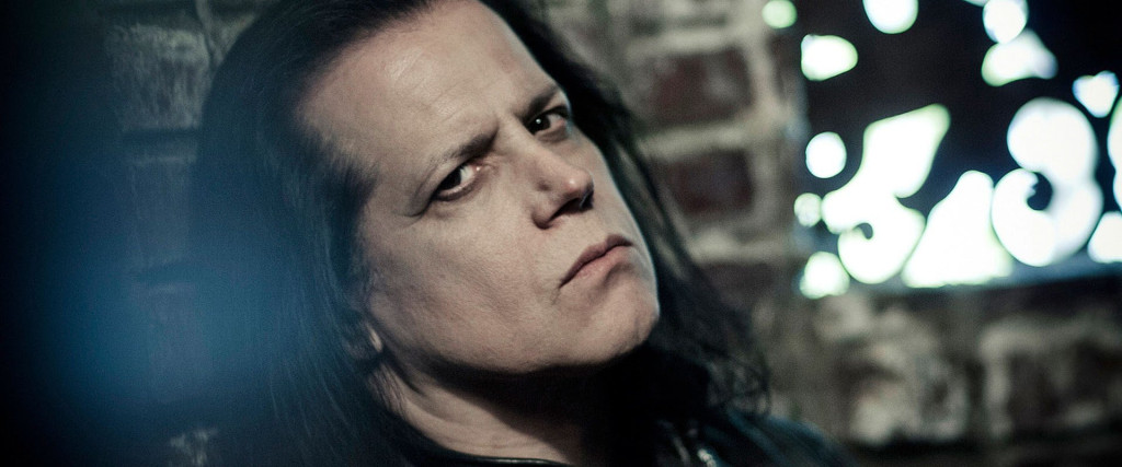 Danzig Danzig is the brain child of legendary punk and heavy metal front man, Glenn Danzig. While overwhelmingly well received by the public upon the release of its self titled debut album in 1988, the group was immediately noted for its departure from the sound that fans had come to expect from the irascible singer. Danzig's previous group, The Misfits and Samhain, had come from a solidly "punk" frame of reference, while the new group was a deliberate throwback to the halcyon days of 1970s hard rock and metal music, i.e., groups such as Black Sabbath, Led Zeppelin, Bloodrock, and the like. Over the years, the group has enjoyed notable success with several key singles, including the Grammy winning live rendition of its signature song, "Mother", which was included on the group's platinum selling release, "Thrall/Demonsweatlive". While the group has remained a top selling concert attraction, Glenn Danzig himself has also branched out into other areas beyond music. One of his most notorious ventures is his line of graphic novels, released under his own Verotik imprint. Hard Rock