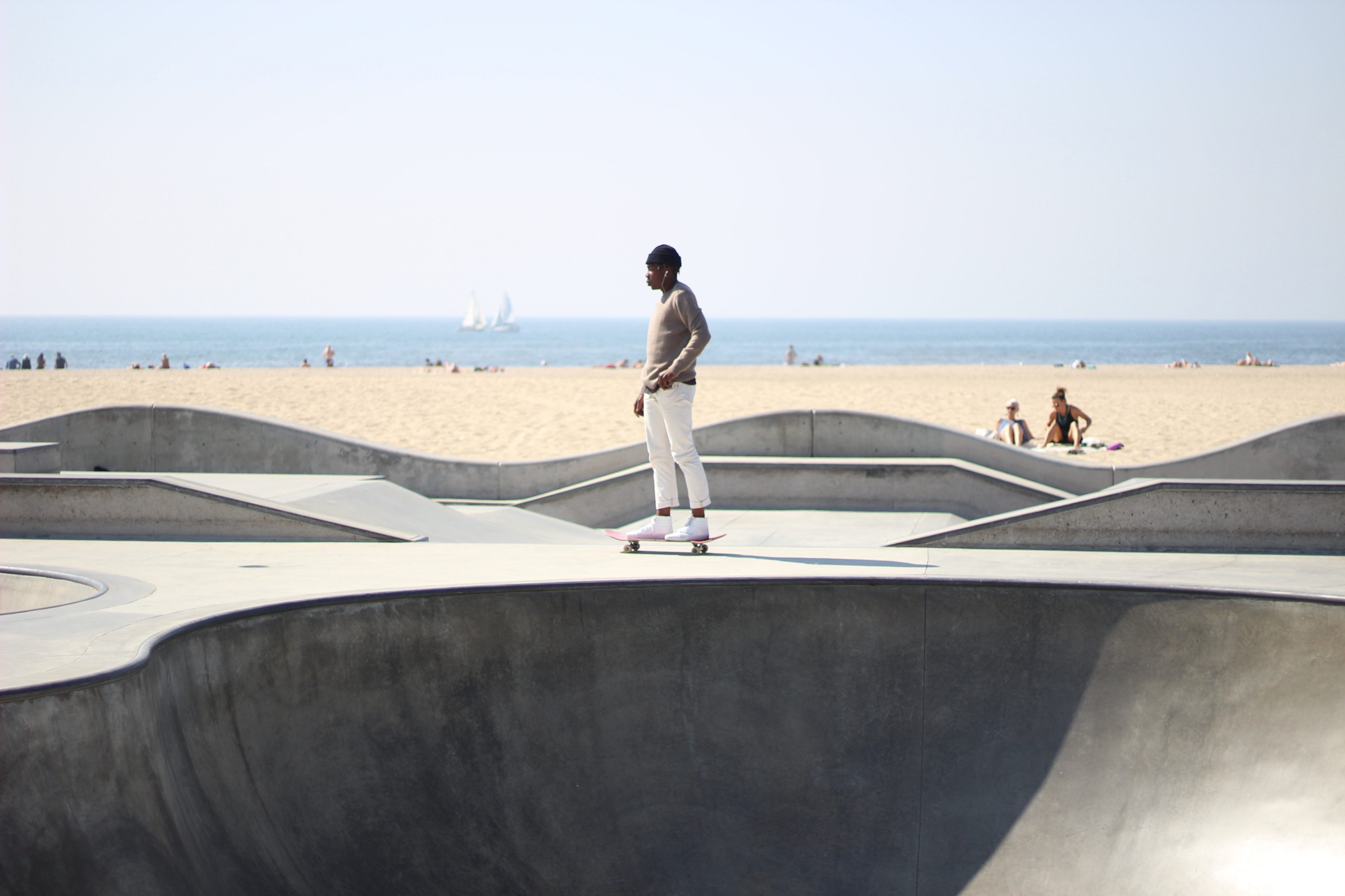 I was at the Venice Skatepark one day and I saw this amazing skateboarder and he asked me to take a couple of lifestyle pictures for him so I took this one really special one that reminded me of Childish Gambino’s song Kauai. man skateboarding