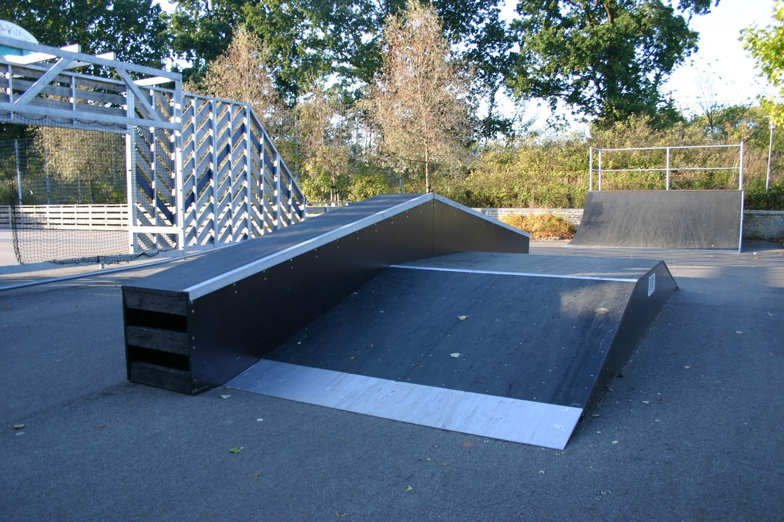 Albertslund Skatepark&nbsp;is relatively small and has a bank at one end, a fun box in the middle with an appurtenant ledge (a so-called hubba), and a quarter pipe at the other end. It also has a long pole rail and stone curbs. The foundation is asphalt. The skatepark is compact which can become a problem as you gain too much speed to perform tricks. The park is not worth traveling far to get to, however, if you are in the neighbourhood, you can stop by for a relaxed session. The park is located about 5 minutes from Albertslund station and is also close to the graffiti wall between Kongsholmhallen and the bicycle track if you follow the railroad.Albertslund Skatepark was built in September of 2012 by Skateland Constructions. It also has street hockey and soccer. The ramps were built after the student city council day in 2011 when all 6th grades of Albertslund presented suggestions for projects in the town. This story goes to show that there is a lot of support for skate-ideas. If you dream it, you can make it happen. Even if your in 6th grade. Awesome Idea?