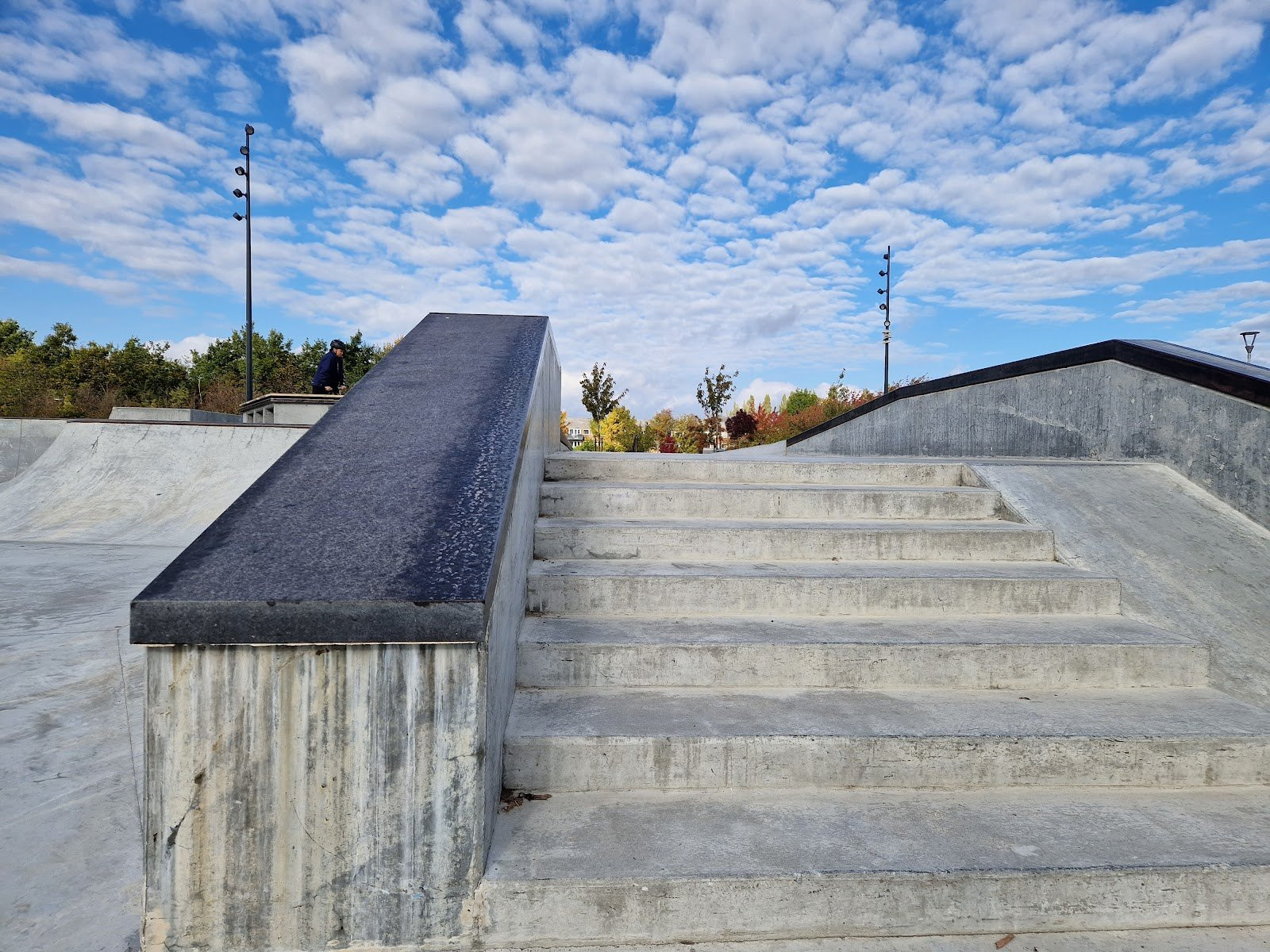 Tårnby skatepark is a skatepark with a lot of obstacles. The park is oblong and has both ledges, euro gaps, manual pads and rails. The obstacles are made of concrete and steel on an asphalt foundation. The park is interesting for street skaters as it does not have any verts.It is easy to gather speed from one obstacles to the next due to the design of the park.Tårnby Skatepark is good for beginners, but can also be fun to skate for experienced skaters because of the many opportunities for lines and the sometimes non traditional placement of the obstacles.