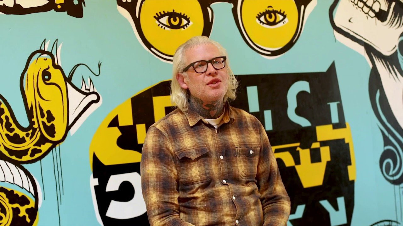 Volcom is honored to work with legendary visual artist Mike Giant for the release of a new Volcom “Featured Artist Series” capsule on July 22, 2019. A relationship that started with an amazing art show in collaboration with New York’s Morning Breath at the Volcom Garden in Austin, TX, last year, has grown into a global release of this iconic artwork.<br /> <br />The capsule, which features Mike’s work on long and short sleeve tees, a pullover hoodie and skull fit beanie (all only black & white, of course), marks the twenty-fourth year of Volcom’s Artist Series, a series that has been responsible for some of our most sought after tees over the years.<br /> <br />Mike Giant is a legendary draftsman, proficient in numerous realms of visual art, including tattooing, graffiti, skateboard graphic design, printmaking and drawing. The lack of color in his work stems from his color blindness, however, rather than being limited by a paired-down palette, Mike has learned to expertly use bold linework to create an illustrative style immediately recognizable as his own.<br /> <br />His influences are readily visible in his work, but he has distilled them into something wholly unique. All Mike needs to create a design is a Sharpie and a sheet a paper—no eraser needed. Skill can be taught but you can’t fake style. Mike’s got both, in spades