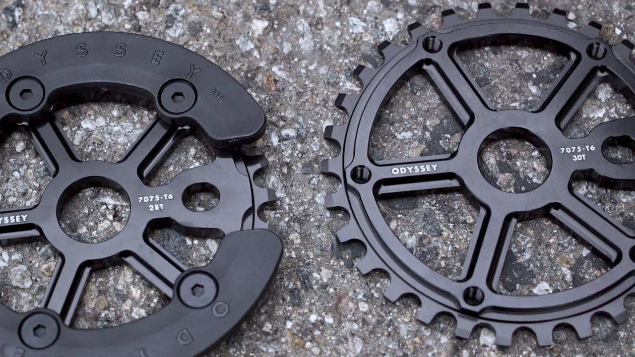 SHOP NOW: https://shop.odysseybmx.com/collections/odyssey-sprockets/products/utility-pro-sprocket<br /><br />Our new Utility Pro guard sprocket is available now.<br /><br />Back in the early 90’s, Odyssey made the bolt-on Havok Sprocket Pocket (plastic guard) as well as the Utility Sprocket in the early 2000’s. We see the new Utility Pro as a modern nod to both of those. <br /><br />The sprocket is 7075-T6 aluminum and comes with a replaceable and removable proprietary plastic guard. The sprocket looks great on its own, so you can run it with or without the guard. The choice is yours. <br /><br />Available in 25, 28 and 30T. Please note - 30t sprocket does not come with guard. Replacement plastic guard/bolts also available separately.<br /><br />FEATURES<br />- CNC’d 7075 Aluminum<br />- Removable proprietary plastic bash guard for enhanced durability and smoother grinds <br />- Compatible with all BMX chains<br /><br />OPTIONS<br />- 25T or 28T with Guard<br />- 30T sprocket only<br /> <br /> <br /> <br /> ---<br /> http://www.odysseybmx.com<br /> ---<br /> http://facebook.com/odysseybmx<br /> http://twitter.com/odysseybmx<br /> http://instagram.com/odysseybmx<br /> http://odysseybmx.tumblr.com<br /> http://youtube.com/odsyvision