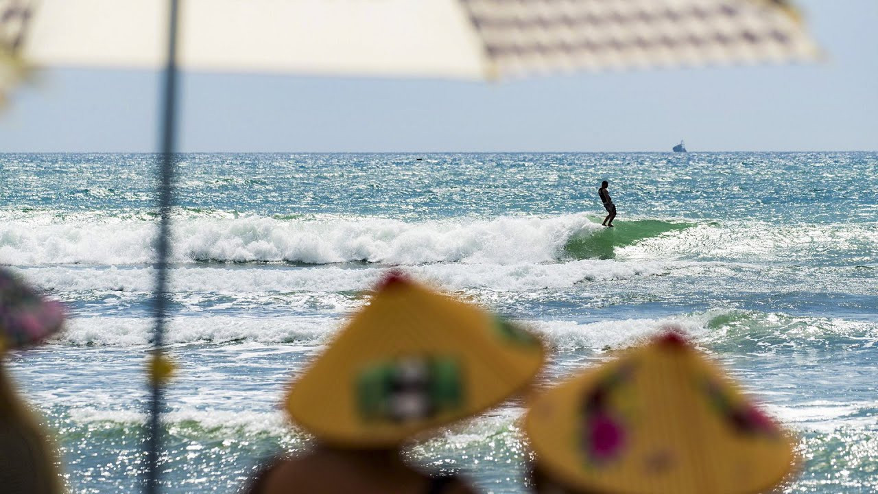 Experiencing the Burgeoning Chinese Surf Scene By Those Who Know It Best<br /><br />Ask any surfer at your local beachie about surfing in China, and they’ll either mention something about a left, or simply stare back at you blankly. While some know that Riyue Bay on Hainan Island can hold surf, most know little to nothing about China’s waves, the people who ride them and the burgeoning surf culture on the coast. In "Local Flavor", a series that aims to give an in-depth look at surf scenes around the world, against the backdrop of the Duct Tape Invitational and Sanya Festival, we pair the iconic surf personalities of the DTI with the local surfers who know their surf scene best, and record the conversations and experiences that follow.<br /><br />In the first episode of "Local Flavor", Riyue Bay local surfer, DB, explains how much it means to the Hainan Island surf community for the Duct Tape Invitational to come to their home. Having had initial exposure to well-known traditional log maestros like Joel Tudor and Alex Knost through videos only, after surfing with the invitees DB said, "Wow, they were our superheroes but now they're our friends." Hit play to watch the elated Duct Tape Invitational hosts of Hainan Island, China share their growing surf scene with the visiting surfers.