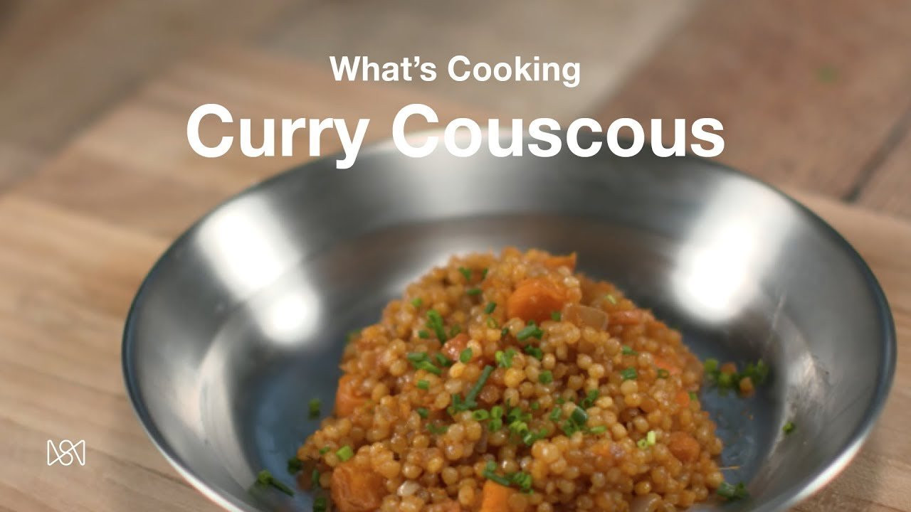 A healthy, comfort food meal—whether made in the wild, or in your own kitchen.<br /><br />****<br />8 Ingredients<br />10-Minute Prep<br />10-Minute Cook<br /><br />Ingredients:<br /><br />Olive oil<br /><br />3-5 carrots<br /><br />2 cloves garlic<br /><br />1 medium onion<br /><br />1 can coconut milk<br /><br />4-5 tbsp red curry paste<br /><br />1 cup couscous<br /><br />1 bunch green onions or chives<br /><br />Directions:<br /><br />Dice up carrots, onion and garlic.<br /><br />Add olive oil to warm dutch oven.<br /><br />Add carrots, onions and garlic, and sauté until lightly brown.<br /><br />Add can of coconut milk.<br /><br />Add curry paste.<br /><br />Cover and let simmer for a few minutes until slightly thickened but still liquid.<br /><br />Add 1 cup couscous.<br /><br />Cover and let simmer until couscous is completely done.<br /><br />While simmering, chop chives or green onions.<br /><br />Serve warm with topping of choice sprinkled on top. Enjoy!