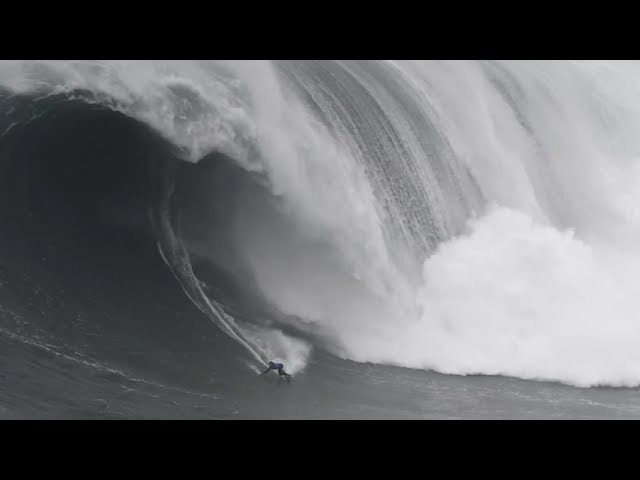 Shop 100 Foot Wave Gear at the store. Hats now $25! https://bigwavemerch.myshopify.com <br />Remember when Lucas Chumbo whipped Kai Lenny into that heaping bowl of spicy goodness during the first Nazaré tow contest? Here's a reminder! One of the many epic big wave rides featured in the HBO docuseries 100 Foot Wave. Video by Pedro Miranda.<br /><br />#100footwave #xxlbigwaveawards #merch #cortesbank #bigwavesurfing #bigwave #xxl #surfing #bigwavesurfing #nazare #jaws #mavericks #adventure #ocean #surf #wave