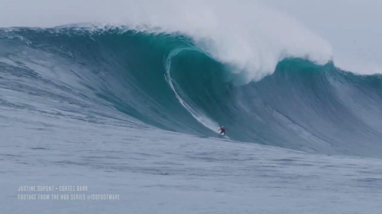 Justine Dupont drops into what may be the biggest wave ever ridden by a female and does it 105 miles at sea at the Cortes Bank during the filming of an upcoming season of the HBO docuseries "100 Foot Wave." Commemorative hoodies and tees have just dropped in the online shop at https://bigwavemerch.myshopify.com/