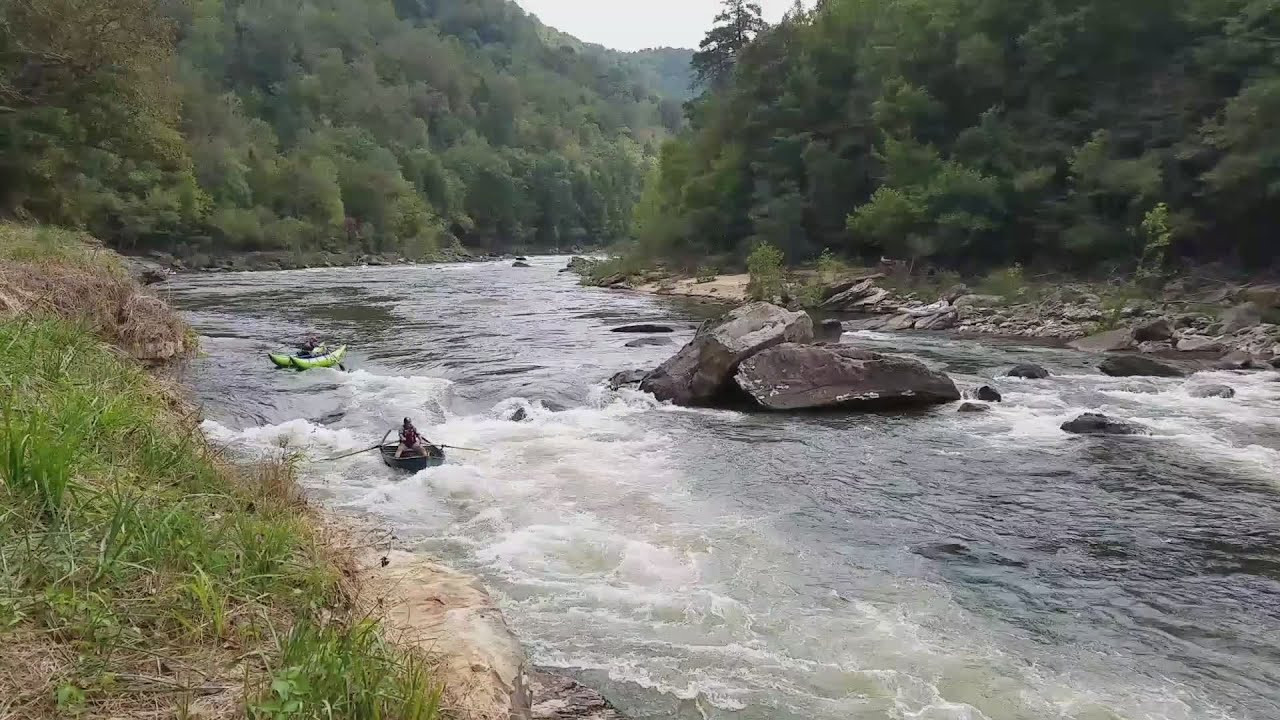 Curtis Warner fires up Sweets Falls in a drift boat he made himself, culminating what is believed to be the first drift boat descent of the Upper Gauley River. Video by Jeff Shaw