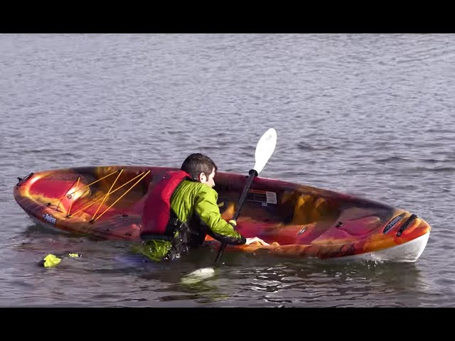 Kayakers have a saying: We’re all between swims. Here paddling instructors Paul and Kate Kuthe show you how to get back in your kayak–or help a friend back into his–if you capsive. This is Episode 7 in our Safer Paddling Series.
