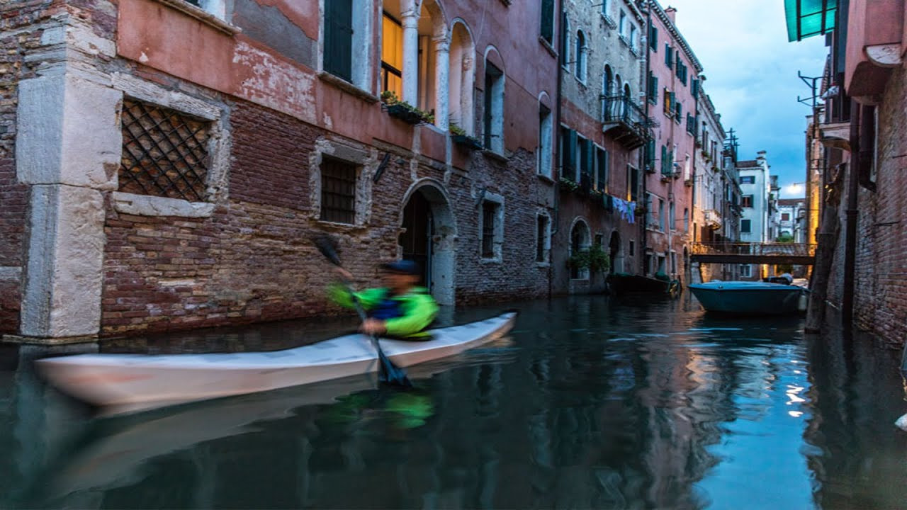 Episode 4 of Carry-on Adventures, powered by Expedia follows Canoe & Kayak magazine Editor Jeff Moag and Contributing Photographer David Jackson on a tour of Venice, Italy, the less traveled way, getting to, and from, the storied City of Water via foldable kayak.