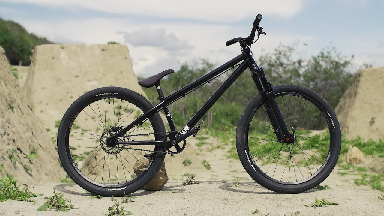 Taking pre-orders now until close of business day April 11 – shipping beginning mid-May<br /><br />We believe 20” bikes are the original Dirt Jumpers and giving that moniker to 26” frames blows, but at the end of the day all that really matters is the ride. Our 26” BJ is designed to go fast and high, soak up bumps and brake better than its smaller counterparts. And unlike a smaller-rigid bike, a 26” bike with a suspension fork and disc brake not only roasts transitions almost effortlessly, it leaves riders in better condition to have just as much fun the next day.<br /><br />Production is underway now, but all sizes/colors will be based on pre-orders so please get yours in ASAP.<br /><br />Geometry based on 100 – 120mm Suspension or equivalent rigid fork<br />Headtube accepts 1.5” Tapered Steerer<br />Disc size is 160mm with 0mm IS to POST mount adaptor<br />Final stickers have not been decided on yet.<br /><br />https://thebuildingdistro.com/product/big-jumper-26-frame/