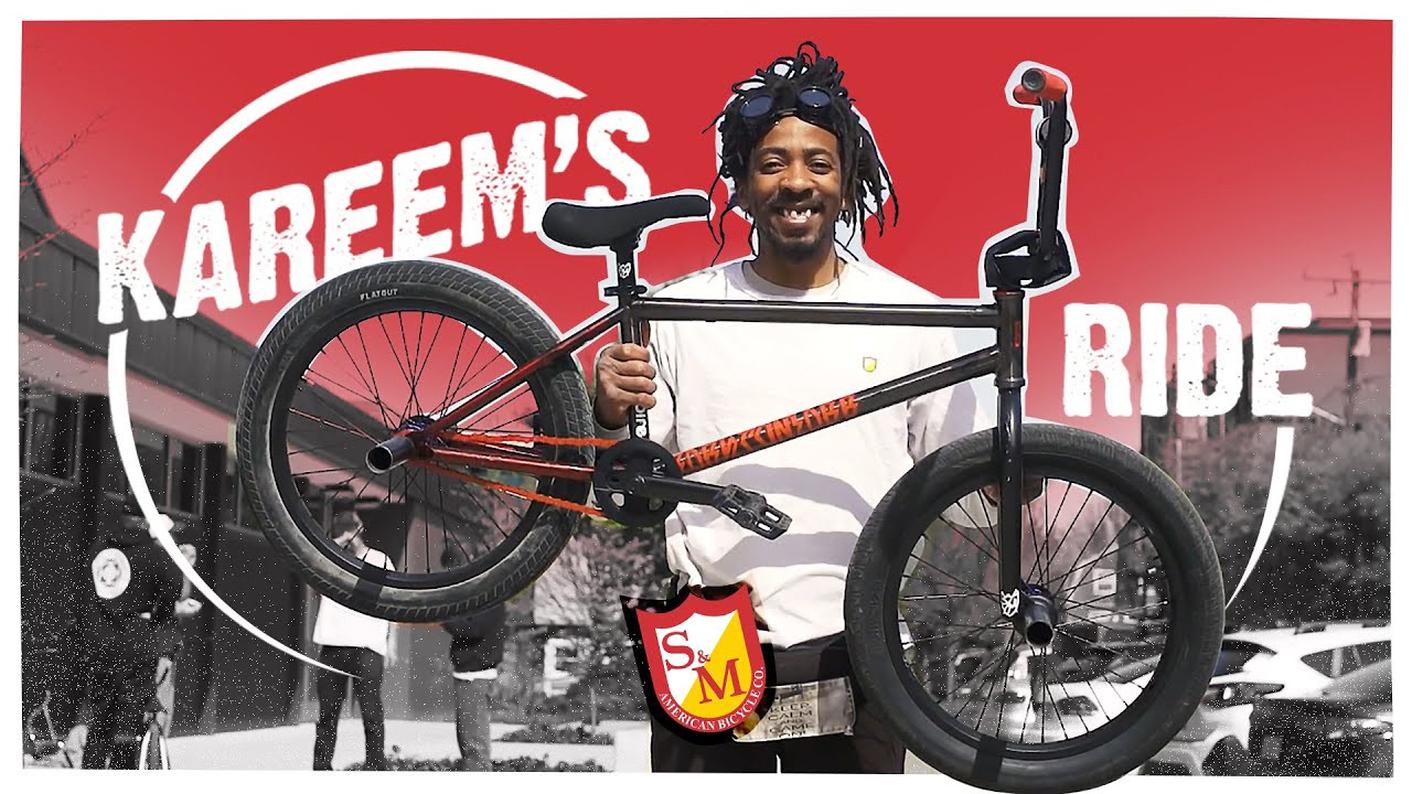 Your boy got a new grill, a new bike and new clips! We filmed this pre-procedure though so consider this BTM bike check your last laugh with Kareem's (from Kareem's World) old smile. Have a look at his Hoder build, his fresh footy and brace yourself... more Kareem action on deck. Peace, Love and Soul Train!<br /><br />https://www.sandmbikes.com/product/hardgoods/frames/hoder-signature-btm-frame/<br />https://www.sandmbikes.com/product/hardgoods/bars/9-hoder-high-bar/<br />https://www.sandmbikes.com/product/hardgoods/stems/enduro-v-2-stem/<br />https://www.sandmbikes.com/product/hardgoods/forks/widemouth-pitchfork/<br />https://www.sandmbikes.com/product/hardgoods/rubber/hoder-grips/<br />https://www.sandmbikes.com/product/hardgoods/small-parts/hoder-btm-pedals/<br />https://www.sandmbikes.com/product/hardgoods/rubber/speedball-tire/<br />https://www.sandmbikes.com/product/hardgoods/seating/sm-stealth-pivotal-seat/<br />https://www.sandmbikes.com/product/hardgoods/seating/long-johnson-stealth-pivotal-seatpost/<br />https://www.sandmbikes.com/product/hardgoods/sprockets/x-man-guard-sprocket/<br /><br />Filmed & Edited by: Stew Johnson