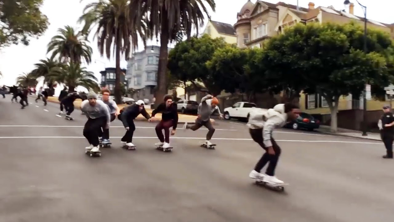 Informal hill bomb contest in Dolores Park, San Francisco, racing down Dolores St. between 21st and 19th. <br /><br />This clip is part of a 100 video playlist, linked by QR codes in Iain Borden "Skateboarding and the City: a Complete History" (Bloomsbury, 2019), the definitive book on classic and contemporary skateboarding.<br /><br />USA orders<br />https://www.amazon.com/Skateboarding-City-Iain-Borden/dp/1472583450/<br />https://www.bloomsbury.com/us/skateboarding-and-the-city-9781472583451/<br /><br />UK/Europe orders<br />https://www.amazon.co.uk/Skateboarding-City-Iain-Borden/dp/1472583450/<br />https://www.bloomsbury.com/uk/skateboarding-and-the-city-9781472583451/<br /><br />‘This book holds the comprehensive evolution of getting radical. How, when, why, and who, told with a genuine passion for the art of skateboarding. Borden continues to be the scribe of skateboarding’s history, perceptively documenting skate culture’s influences on wider society.’<br />Oliver Percovich, Founder of Skateistan<br /><br />‘Borden’s work is as varied and bedazzling as the most expert of skaters. He addresses skateboarding’s romantic, subcultural past through its global, social, and political present. Throughout, his voice is readable and approachable, a fine balance of the committed academic and beguiled practitioner. The result is nothing short of indispensable.’<br />Kyle Beachy, Associate Professor, Roosevelt University