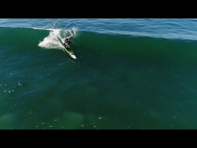 The Infinity team owner catches a few fun waves on a 14-foot raceboard during classic fall conditions at San Onofre.