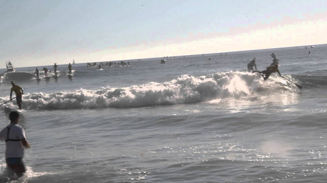 Kai Lenny and Connor Baxter get into a spicy exchange on a wave during the 2014 Battle of the Paddle.