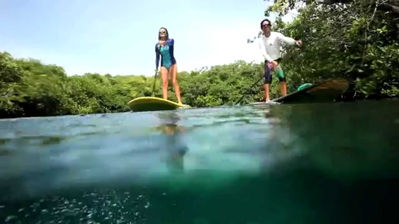 Morgan Hoesterey and Gillian Gibree explore the placid waters of Mexico's Casa Cenote.