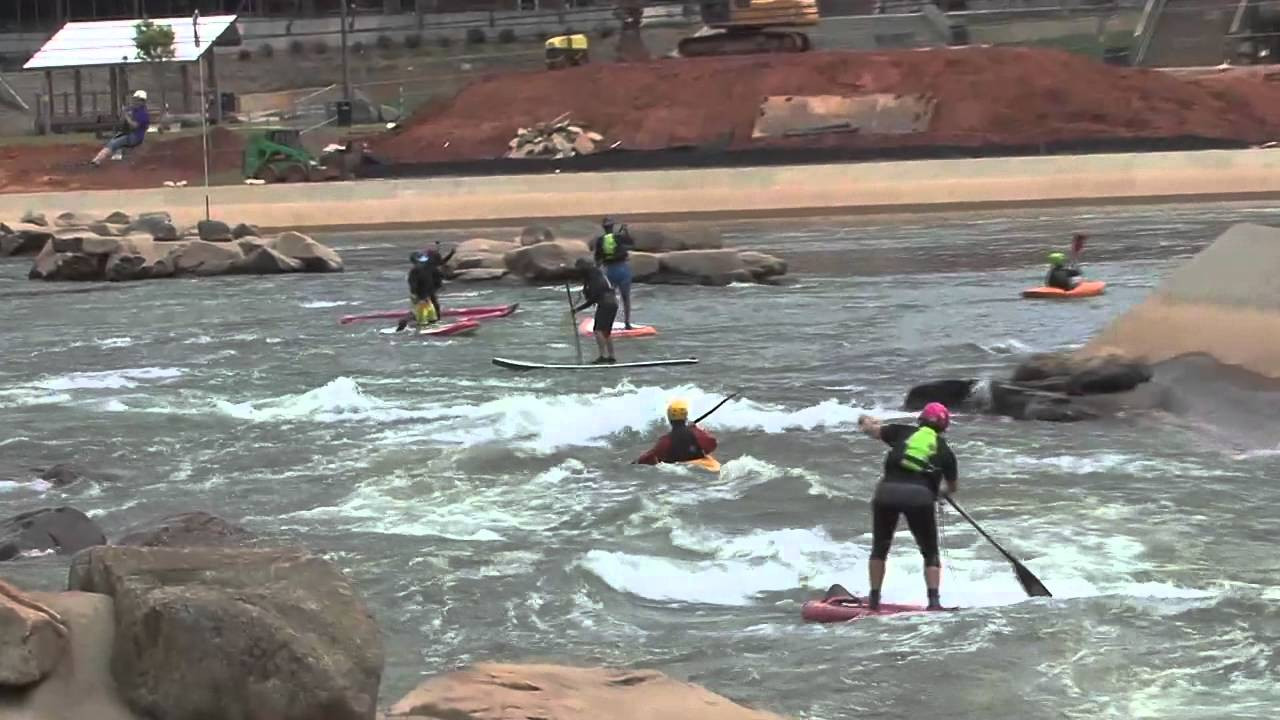 Mike Tavares, Chuck Glynn and Haley Mills get in some training time for the Payette River Games at the US Whitewater Center in Charlotte, North Carolina