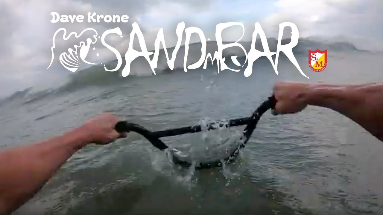 Dave Krone is a radical dude, one who deserves some radical Signature Bars... allow us to introduce, the SAND BAR! Now available at fine BMX establishments near you!<br /><br />RISE: 9.25″<br />WIDTH: 29″<br />UPSWEEP: 2°<br />BACK SWEEP: 12°<br />CROSS BAR: .750″<br />WEIGHT: 2.5 lb<br />MATERIAL: 4130 CrMo Straight Gauge<br /><br />https://www.sandmbikes.com/product/hardgoods/bars/sm-krone-sand-bar/<br /><br />Biking/Stunts/Edit: Dave Krone https://www.instagram.com/kavedrone/<br />Film: Samantha Pine https://www.instagram.com/dreamweaverxo/