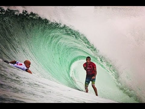 http://www.TheSurfChannel.com<br /><br />A historic match-up between world champion surfers Kelly Slater (USA) and Joel Parkinson (AUS) took place during the Final of the 2013 Quiksilver Pro Gold Coast. The first ASP World Tour event of the year, the Quik Pro packed thousands of fans on the sand of Kirra Beach in Queensland, Australia to watch what was promised to be a classic heat in 3-5 ft barreling rights. Parko almost scores a perfect ten, but is cut off by Slater who had priority and is the master of competitive strategy, resulting in a middle finger from Parko. In the end, it was Slater that scored the highest heat total of 18.56 over Parkinson's 17.47, to claim his 52nd World Tour win. <br /><br />See the photos and results: http://www.thesurfchannel.com/slide/kelly-slater-takes-crown-at-kirra-as-quiksilver-pro-champion/