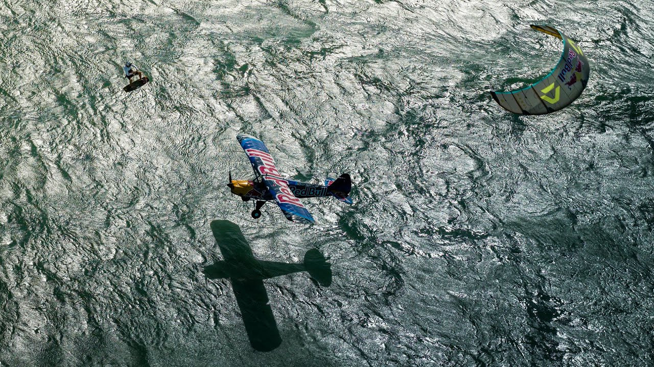 Extreme big-air kitesurfer Lasse Walker made history on January 16, 2025, by jumping over a low-flying plane piloted by Red Bull Air Race champion Lukasz "Luke" Czepiela off Dolphin Beach, Cape Town. <br /><br />Walker, inspired by Dutch kitesurfing legends, turned professional in 2015 and is known for daring jumps over obstacles like freighters and piers.<br /><br />His latest feat involved soaring 15 meters above Czepiela's plane during perfect conditions, showcasing remarkable precision and trust. <br /><br />The two spent two years preparing, with Czepiela relying on slow-flying skills and Walker practicing thousands of jumps.<br /><br />The result was a seamless collaboration that thrilled spectators and set a new standard for aerial stunts.<br /><br />Full story:<br />https://www.surfertoday.com/kiteboarding/kitesurfer-lasse-walker-jumps-over-low-altitude-plane<br /><br />Footage: Red Bull