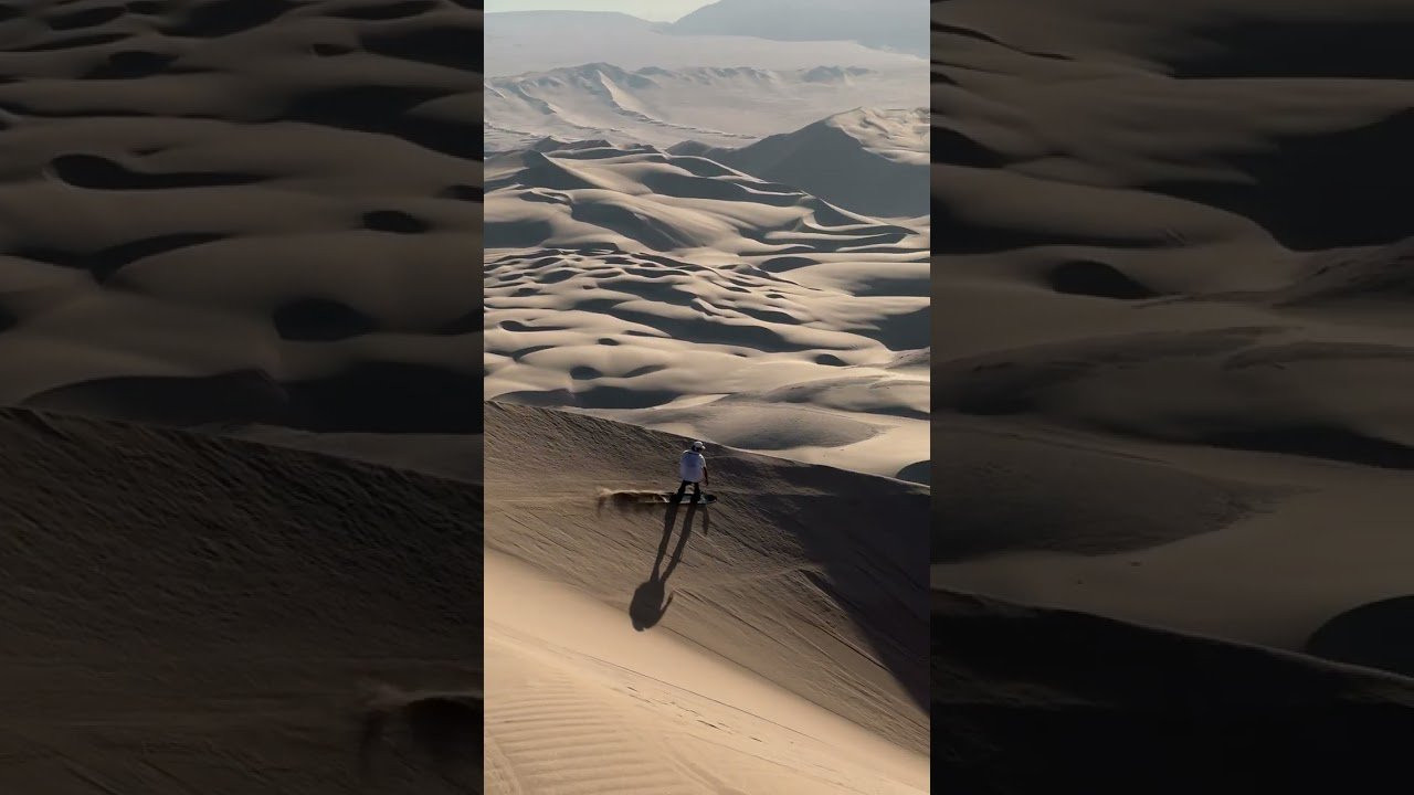Watch how Chilean Franco Diaz rides a dune on his sandboard.<br /><br />The sandboarder from Iquique rides the dunes of the Atacama Desert with a style influenced by surfing.<br /><br />Diaz, who also runs Munay Sandboard, began sandboarding in 2014 after adapting skateboards for sand.<br /><br />He frequently rides Cerro Dragón and Duna Cerebro, the latter being his favorite and most challenging dune.<br /><br />Diaz's background in surfing, bodyboarding, and skateboarding shapes his unique approach to sandboarding.<br /><br />Sandboarding is popular in Iquique, attracting enthusiasts worldwide.<br /><br />Diaz prefers riding with friends on the city's dunes, which offer natural ramps and walls without obstacles like animals or stones.<br /><br />Despite the sport's recent rise in popularity due to social media, Diaz hopes more people will embrace sandboarding.<br /><br />He is currently learning to paraglide, aiming to combine it with sandboarding for a thrilling new experience.<br /><br />Full story:<br />https://www.surfertoday.com/surfing/the-sandboarder-who-rides-dunes-like-waves