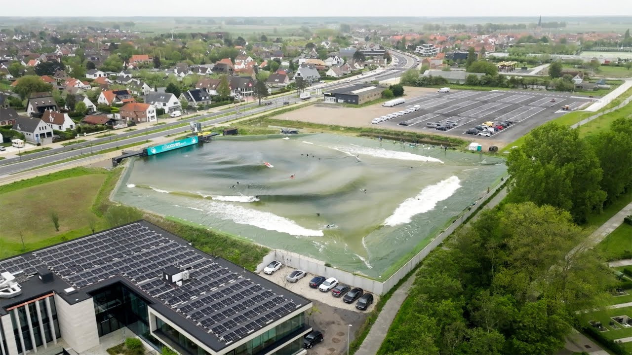 AllWaves, a revolutionary wave pool technology from Belgium, brings surfing to artificial lakes, providing landlocked surfers with an authentic surfing experience.<br /><br />Designed by wave energy expert Steven Nauwelaerts and serial entrepreneur Geert Nauwelaerts, AllWaves aims to create the world's safest wave pool with a natural look and feel.<br /><br />The system uses a durable textile pillow on the basin floor, moved hydraulically to mimic ocean waves.<br /><br />This technology allows for customizable waves, accommodating all skill levels.<br /><br />"Our wave generation knowledge is captured in intelligent algorithms with infinite wave variability. A simple push on the app makes the desired wave roll," notes CEO Steven Nauwelaerts.<br /><br />AllWaves' design includes a natural-looking lake with 360-degree sloping beaches and generates a wave every seven seconds, enhancing surfer experience and investor ROI.<br /><br />The system can create waves up to six feet in a 100-meter by 100-meter basin, holding 64 surfers simultaneously. It features left and right-hand point breaks and an A-frame peak.<br /><br />With a lifelong guarantee, AllWaves partners with leaders in hydraulic manufacturing and high-tech textiles to ensure reliability.<br /><br />The technology is on display at the company's site in Knokke-Heist, Belgium, where it runs on renewable energy, highlighting its carbon-neutral footprint.<br /><br />AllWaves is ideal for recreational surf parks, water parks, professional practice venues, and mixed-use real estate developments, combining safety, aesthetics, and energy efficiency.<br /><br />Footage: AllWaves<br /><br />Full Story:<br />https://www.surfertoday.com/surfing/allwaves-the-submerged-pillow-wave-technology-made-in-belgium