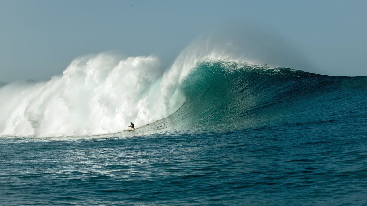 The WSL has declared that Laura Enever of Australia has achieved a new Guinness World Record for the "Largest wave surfed paddle-in (female)."<br /><br />This historic feat was validated by the WSL's rigorous review as part of their Big Wave Record Chase, with Enever's ride in 2023 reaching a staggering 43.6 feet (13.3 meters), setting the record for the largest wave ever surfed by a female through paddle-in.<br /><br />At the age of 31, the North Narrabeen native took on a colossal wave at the renowned Outer Reef on Oahu's North Shore on January 22, 2023.<br /><br />Enever expressed her exhilaration about the achievement, stating, "I knew it was big when I paddled into it, and then when I took off, I looked down, and I knew it was definitely the biggest wave I've ever caught."<br /><br />She acknowledged the importance of this wave in her career, emphasizing the personal breakthrough and its subsequent recognition months after the event.<br /><br />She also paid homage to the trailblazing women in big wave surfing, including Andrea Moller, whose previous record she narrowly surpassed.<br /><br />Enever's gratitude extended to these role models who inspired and motivated her to excel in the sport.<br /><br />Adding to her impressive resume, which includes titles such as the ISA Junior World Champion and World Junior Champion, Enever has been a formidable competitor on the WSL Championship Tour and in big wave events.<br /><br />WSL's Jessi Miley-Dyer lauded Enever's bravery and inspirational role in the sport, highlighting the World Records as a means to honor such groundbreaking accomplishments.<br /><br />In Narrabeen, New South Wales, Enever was presented with the Guinness World Record certificate, a moment she shared with loved ones.<br /><br />Reflecting on her career path, she remarked on her transition from professional surfing to pursuing big waves, a choice validated by this prestigious recognition.<br /><br />Enever's new record slightly eclipsed Moller's 2016 achievement at Pe’ahi, Maui. Moller, a revered figure in the sport and a dedicated paramedic, has been a leading advocate for women's progression in big wave surfing.<br /><br />Regarding the record-verification process, the WSL Science Team, spearheaded by Michal Pieszk of the Kelly Slater Wave Company, utilized advanced techniques to measure the waves from the season's footage.<br /><br />By correcting video frames and calibrating using known dimensions, such as Enever's body measurements, the team meticulously determined the wave's height, marking a significant milestone in big wave surfing history.<br /><br />Footage: @iangrose5814 / @wsl <br /><br />Still: @_danielrusso_<br />_danielrusso_