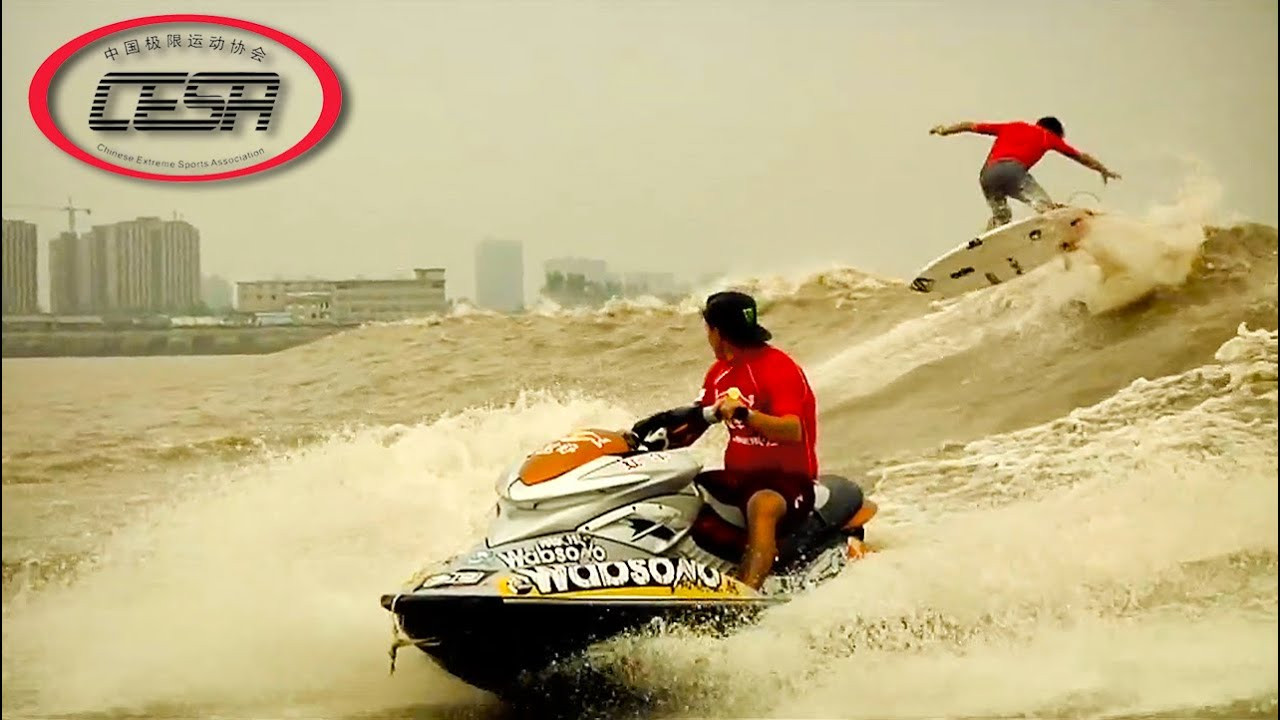 SURF the most unique Chinese Tidal Bore wave in the world <br />Subscribe Here for daily XTreme surfing videos: http://goo.gl/1cXBGZ<br /><br />The teams are back at it again surfing the most unique wave in the world the "Silver Dragon" Four teams will descend onto Hangzhou China to, compete riding this tidal bore in the Red Bull Qiantang River Shootout. Featuring Mark Mathews, Richie Vaculik, Anastasia Ashley, Steve Newton, Trent Munro, Phil Macdonald, Makua Rothman, and Kalani David. <br />Enter the Silver Dragon River, Film/ edit Matt Wybenga<br />Fuel Tv Australia<br /><br />Subscribe Here for daily XTreme surfing videos: http://goo.gl/1cXBGZ<br />and got to :<br />Website: http://www.x-tremevideo.com<br />Twitter: http://twitter.com/XTremeVideo<br />Facebook: http://www.facebook.com/XTvideo