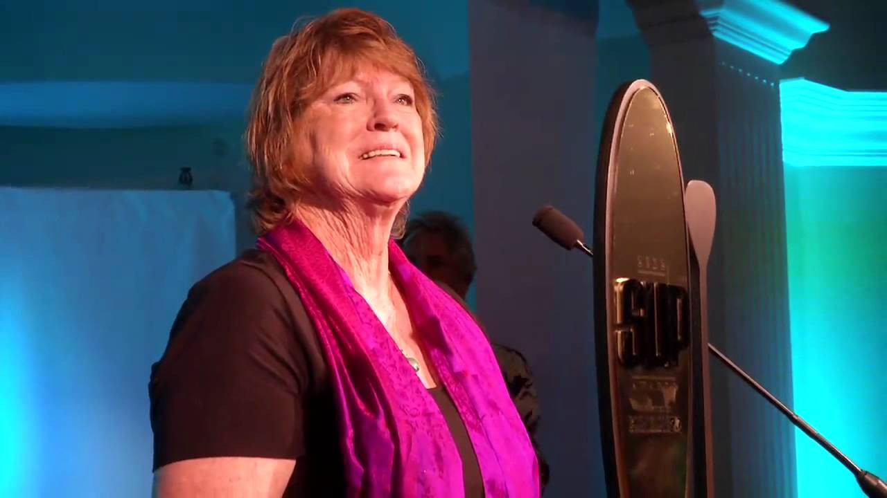 PADDLER: Michele Baldwin, accepted by her mother, Ruth Frazier<br /><br />Fighting stage 4 terminal cervical cancer, 45-year-old mother of three Michele Baldwin decided to standup paddle 700 miles down the holy Ganges River. Hoping to raise awareness to prevent HPV and cervical cancer—and $100k for the Global Initiative Against HPV And Cervical Cancer (GIAHC)—Michele paddled from northern India to the eastern city of Varanasi. After completing her pilgrimage, Michele returned home to New Mexico to spend her final days with her family. She died in February.