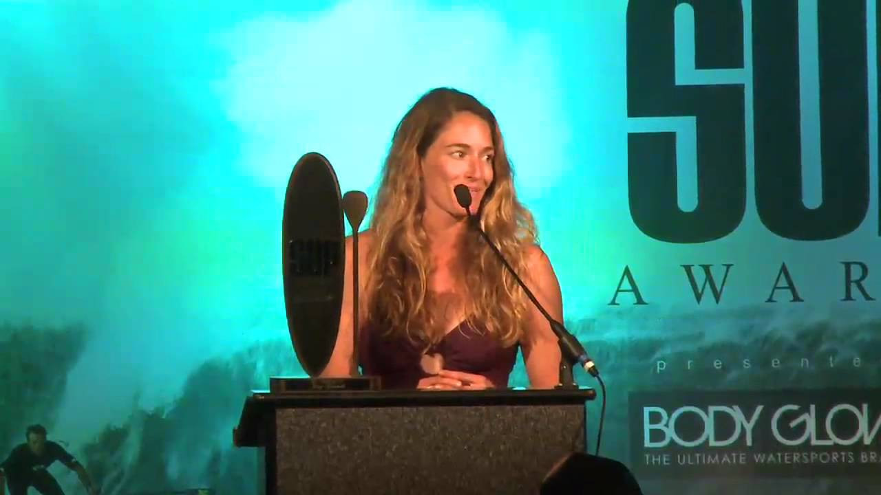 For more, go to www.supawards.com<br /><br />HOME: Kona, HI<br /><br />SPONSORS: Garmin, Kona Brewing, Naish, 2XU, The Mauna Lani Bay Hotel, Futures Fins, Watermans Applied Science, Navitas Naturals, Bonk Breaker, Oakley<br /><br />ACCOMPLISHMENTS:  As of 2010- she is 1 of 5 people in the world to SUP the entire Hawaiian Island Chain • 2011 SUP Awards, Number on ranked female paddler • 2011- Tahoe Fall Classic- 22 mile- 1st female overall • 2011- Battle of the Paddle Hawaii- 1st Place Overall<br /><br />QUOTE: "SUP, to me, means being active, traveling, exploring, having fun, living and enjoying life. Standup paddling has given me so many amazing and unique opportunities and I will always be grateful for that."