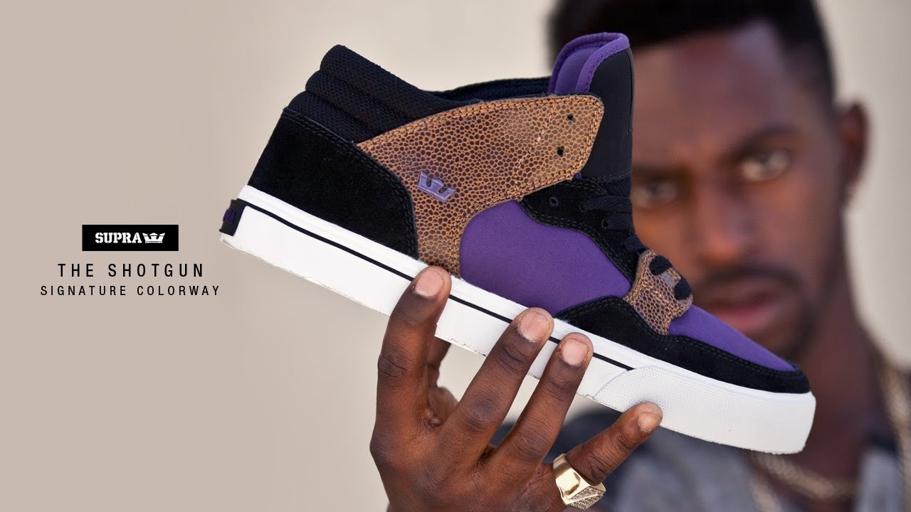 SUPRA is proud to introduce the Shotgun, a classic vulcanized mid top with an athletic-inspired toe box and extended heel bar, available now in three distinct color profiles including a Keelan Dadd signature color way. <br /><br />"I like this shoe because it's different." says Dadd who is the first of the team to make his mark on this new SUPRA model. "You can switch up your swag with this shoe," Dadd continues. "Get some crazy clothes—go to a thrift store and get some shit to go with it. I like it. Hell yeah, man." <br /><br />Dadd customized his signature Shotgun with replica reptile leather, purple nylon and black suede. Leather and suede are applied at key contact areas of all Shotgun models to protect against wear, while nylon or canvas allow for ventilation, and a padded mesh interior ensures optimum comfort.The scalloped collar and ribbed heel supply padding and ankle support, while the vulcanized sole provides excellent board feel and superior traction. <br /><br />The Shotgun is available now in three new color profiles—black suede and canvas, black and grey suede, and Keelan Dadd's signature color way—at better skate retailers worldwide and http://www.suprafootwear.com.<br /><br />SITE: http://www.suprafootwear.com<br />FACEBOOK: http://www.facebook.com/suprafootwear<br />TWITTER: http://www.twitter.com/suprafootwear<br />INSTAGRAM: http://instagram.com/suprafootwear<br />PINTEREST: http://www.pinterest.com/suprafootwear<br />TUMBLR: http://www.suprafootwear.tumblr.com/<br />VIMEO: http://www.vimeo.com/suprafootwear