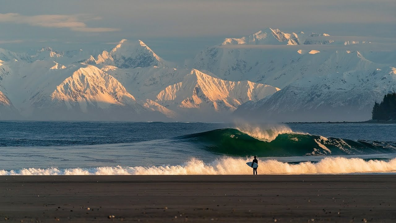 Josh Mulcoy’s first time to Alaska was for SURFER way back in the early ’90s, and it landed him a cover Opens a New Window. . That trip also began an obsession with the state that’s lasted two and a half decades, in which time he’s been back at least once every year. “There’s been some trips that had some fun waves, and some trips that had some really bad waves,” says Mulcoy in his new film, “Within Reach”, above. “I guess I have an addiction to places that never get good, because I keep going back. Sounds stupid, but it’s true: I’ve gotten to surf perfect waves in other places but I’ve never had that feeling like I’ve had in [Alaska], when it all comes together.”<br /><br />For Mulcoy, it certainly all came together on a recent expedition, the first time he’s truly scored in Alaska since that maiden trip as a teenager. “To pull up this time and have it doing it again was just a dream,” Mulcoy continues. “Like 25 years? Are you serious? To get it again with my friends…I dunno, those were the best waves I’ve had in years. And the best moments of surfing, because of where it was and what it was.”