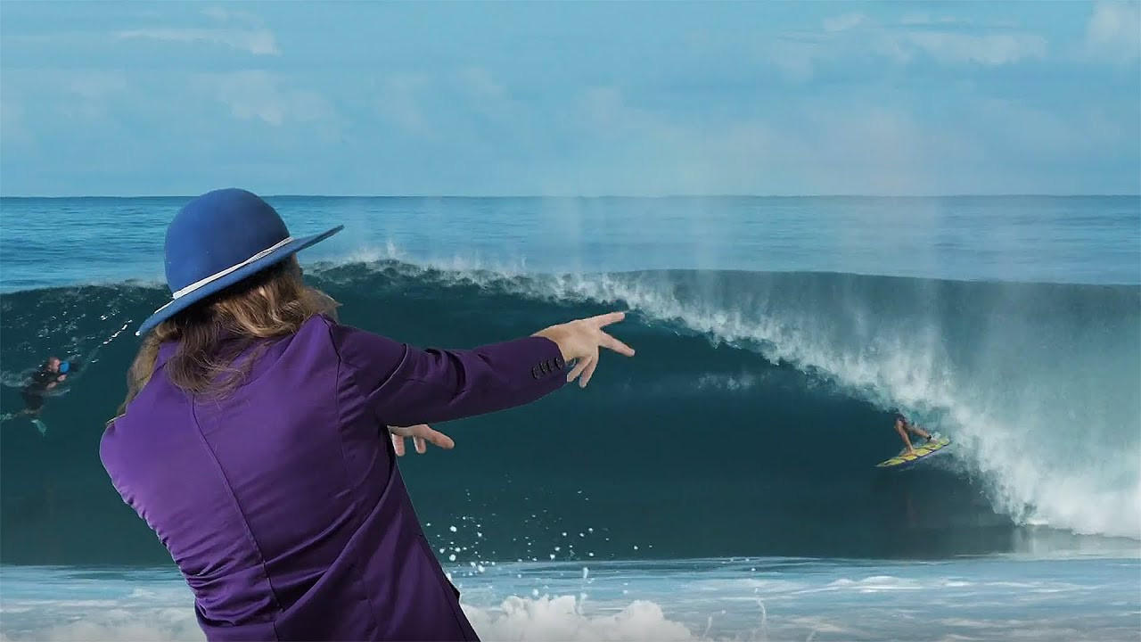 Last weekend, in the parking lot of a Rip Curl store located just a stone's throw from Swamis in Encinitas, CA, a street artist who goes by the moniker Madsteez stood on top of a towering ladder with a spray can in his hand. A crowd of locals watched as he put the finishing touches on a large-scale mural he had been painting for days on the shop's façade. With each new layer of paint, a vivid, barreling righthander came to life. A Kaleidoscope of color–gradients of yellows, oranges, reds, purples and blues—blended together on an acid-drenched wave face.<br /><br />The mural, which you can now glimpse while cruising north on the 101, stamped the new collaboration between Rip Curl and the artist formally known as Madsteez–or, if you know him personally, as Mark Paul Deren. For over a decade, Madsteez has garnered international recognition for his brightly-colored, large-scale exterior paintings–mostly renditions of characters, both strange and familiar, depicted with purple faces in front of graphic backgrounds. Just recently, while visiting Australia, Madsteez daubed the faces of Mick Fanning, Tyler Wright and Gabriel Medina on the front of the Bells Beach Rip Curl store.<br /><br />When he's not painting huge renderings on the side of buildings, Madsteez spends his free time surfing. Madsteez claims that his first passion is, first and foremost, riding waves. According to the edit above—wherein which Rip Curl team rider Mason Ho interviews the artist–his trademark color palette was partly inspired by the tropical-hued sunsets he would see while on surf trips to Bali.<br /><br />“The sunsets were so violet and they would go these crazy oranges and then burning reds so it was almost me witnessing that for the first time and coming back home and being so inspired and that's when I just started painting,” says Madsteez.<br /><br />But his obsession with surfing wasn’t the only thing that guided him as an artist. Madsteez was born blind on one eye, but rather than seeing nothing at all in his bling eye, the artist now sees “wild ass colors,” as he describes it, through his left eye. This, he explains, is the main reason he paints his subjects as purple beings. “Everything stems from how I see the world,” he says. “At the time [when he was diagnosed] there was 60 known cases. It’s this weird, rare anomaly that's creating art from how I see out of my blind eye.”<br /><br />“Everything I create, I first and foremost create for myself,” says Madsteez. “And it’s so wild to step back and look at something that may have just been a white wall before and I can transform worlds by what I can do. And that is so wild and I get super excited every time that happens.”