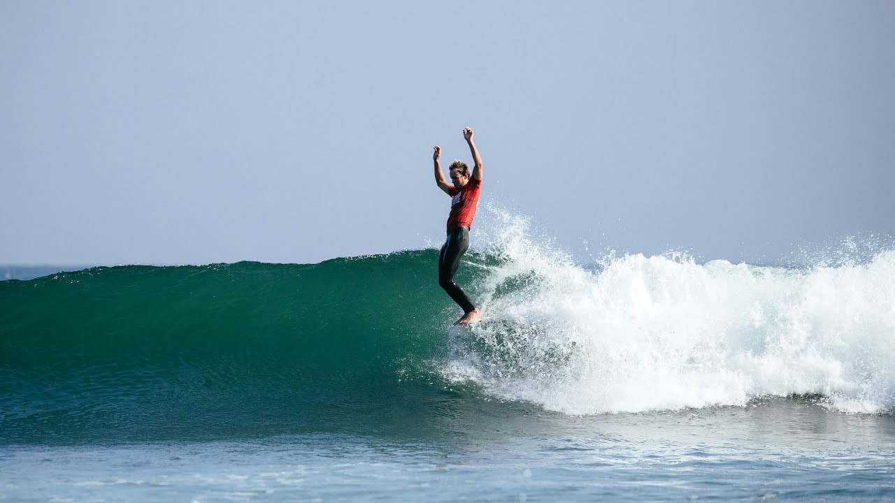Harrison Roach and Soleil Errico won the 2022 Longboard World Titles in world-class, three-to-four foot conditions at First Point in Malibu, Calif.<br /><br />Errico claimed her second World Title at her home break, while Roach claimed his maiden World Title.<br /><br />Errico Claims Second World Title at Home<br /><br />Today, Errico got to celebrate her second World Title alongside family and friends at the wave that helped shape her as a surfer.<br /><br />She got off to a quick start in her Finals matchup against an in-form Sophia Culhane, dropping a 6.83 in the opening minutes.<br /><br />A solid set offered a huge opportunity for both competitors, with Culhane earning a 5.67 and Errico an excellent 8.67.<br /><br />A brilliant exchange between the two world-class competitors then saw Errico's footwork and transitions lead to an 8.10 as Culhane's 7.33 kept her out of a combination situation, but Errico's finishing 8.37 secured her win and the World Title. <br /><br />"I've been visualizing this for the last three months," said Errico.<br /><br />"Winning on my home turf couldn't be any better, and I'm just so happy that all the dedication and sacrifice I've put into this paid off."<br /><br />Errico's immaculate Finals Day run began with arguably the heat of the 2022 Longboard Tour season, with Errico taking on reigning event winner Alice Lemoigne.<br /><br />Both surfers turned in excellent 16-point-plus heat totals and traded off as the heat leader multiple times.<br /><br />Needing a 7.70 in the final minutes, Errico was able to take the win with a 7.80, landing herself a spot in the Semifinals.<br /><br />Errico's momentum was unstoppable, carrying it into a critical Semifinal heat against event dark-horse Mason Schremmer, where she accrued yet another excellent heat total of 17.57 before the decisive Final against Culhane.<br /><br />Roach's road to the World Title began with overcoming multiple event threats, including three-time WSL Longboard Champion Taylor Jensen in dominant fashion, accruing the event's highest single-scoring wave, a 9.17, and highest heat total of 18.17, in their Semifinal bout.<br /><br />Roach also had to overcome an in-form Cole Robbins with a buzzer-beater in the Quarterfinals after a Round of 16, back-and-forth battle with former WSL Longboard Champion Steven Sawyer.<br /><br />The Australian made his big return to competing in 2019 as the WSL Longboard Tour made its transition and had one goal in his mind, claim a World Title.<br /><br />Seen as one of the sport's top-tier competitors from a young age, Roach's persistence and undeniable talent helped pave the way to where he is today and made his dream a realization.<br /><br />Australian Claims Maiden World Title <br /><br />Australia's Harrison Roach came into the 2022 World Title race with the goal to surpass last season's runner-up finish.<br /><br />He showed every sign of accomplishing this over the two event days at Malibu, culminating in the Final against World No. 2 Kaniela Stewart. <br /><br />The men's Final unraveled with Stewart accruing a 6.33 to get an early start against Roach.<br /><br />The Australian fired back with an excellent 8.83 to briefly take the lead before Stewart found a quick backup, notching a brilliant 7.67 and pushing his lead.<br /><br />Just shy of the 20-minute mark, a crucial exchange witnessed Roach find a gem opportunity to once again regain the lead posting a 6.77 as Stewart's 7.57 fell short of the new, near-excellent 7.94 requirements. <br /><br />The final minutes provided more drama as Roach fell on a great wave and left Stewart with one last chance to claim a win.<br /><br />However, Stewart's style and flow all the way to the beach missed the required score by .04.<br /><br />"I'm very happy, I got close last year, and I realized at that point how much it takes to get here again," said Roach.<br /><br />"I just put my head down, (and) made it count. I would've loved to have not fallen on that second good one, I left the door open for Kani (Stewart) there, and he got close. When the beach commentator announced it, I thought he had the score. It's a relief for me."<br /><br />Kaniela Stewart's Maiden World Title Hopes Fall Short By Narrow Margin<br /><br />The 2022 World No. 2 Stewart started his Finals Day campaign with impeccable performance, taking out fellow Hawaii surfer Keoki Saguibo.<br /><br />The 21-year-old kept his world-class form intact, heading into a high-stakes Quarterfinal against Longboard Tour veteran Tony Silvagni. Silvagni pushed Stewart to the limits and left him needing an excellent score, which he achieved with under five minutes to go.<br /><br />The ocean provided for Stewart once again in a Semifinal clash with event standout Declan Wyton and with one minute remaining, he earned an 8.07 to make his appearance in the Finals. <br /><br />"It was so much fun to be out there, Harrison (Roach) was killing it," said Stewart.<br /><br />"There were waves, and it was so fun to be surfing with one other guy out at Malibu. It's perfect out there, and we had a good time."<br /><br />2022 Cuervo Classic Malibu Longboard Championship | Finals<br /><br />Men<br />1. Harrison Roach (AUS) 15.93 <br />2. Kaniela Stewart (HAW) 15.57<br /><br />Women<br />1. Soleil Errico (USA) 17.04<br />2. Sophia Culhane (HAW) 13.00