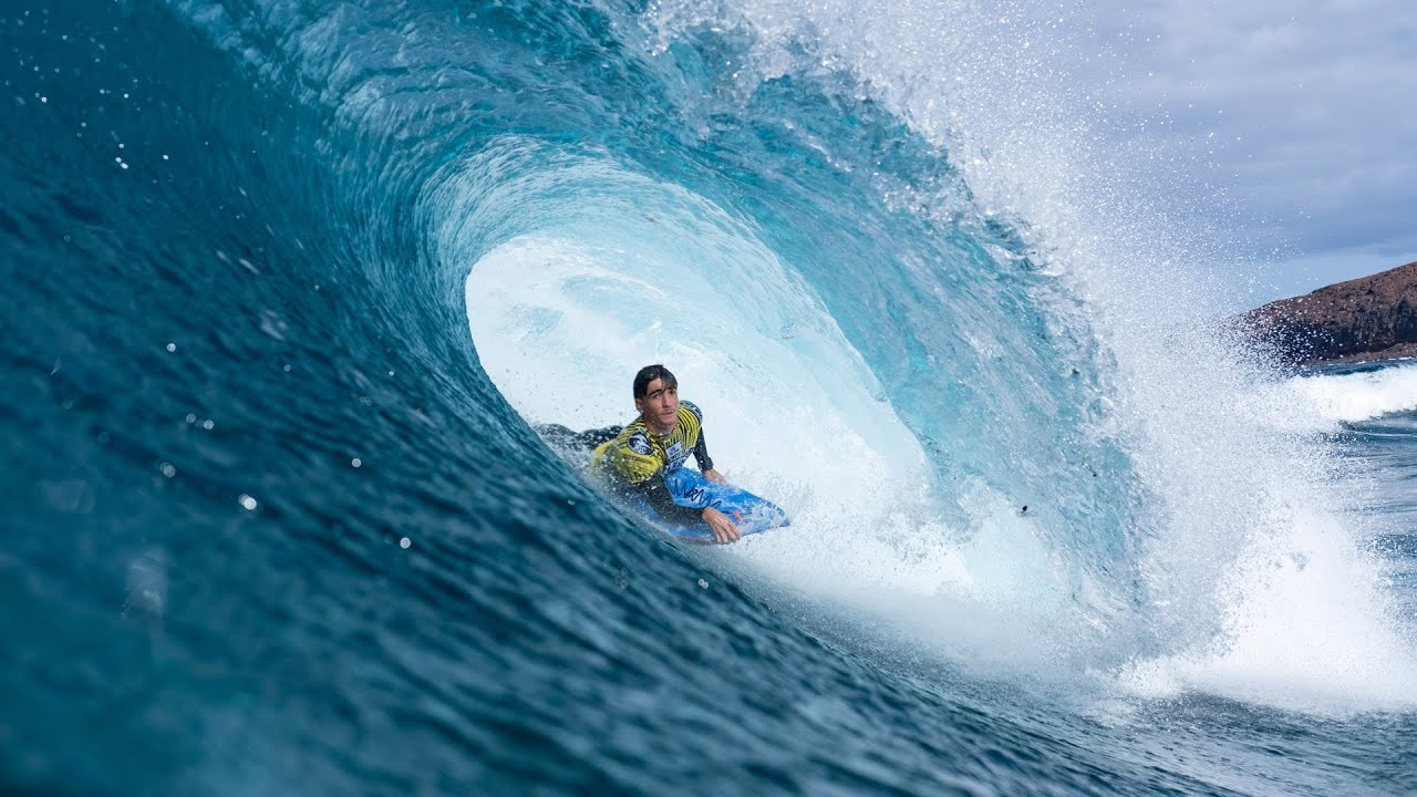 The fifth day of competition at the 2021 World Cup Gran Canaria Frontón King kicked off with perfect waves at Gáldar, Gran Canaria.<br /><br />After several lay days, the wait was worth it, and "The Beast" showed its best face, thanks to ideal swell and wind conditions.<br /><br />Fans flocked to the infamous venue to see the world's best bodyboarders battling each other for the prestigious bodyboarding trophy.<br /><br />Two world champions - Pierre Louis Costes and Tristan Roberts - hit the water for the day's opening heat and put on a great show, with the Frenchman winning the matchup followed by the South African.<br /><br />But there was more to come.<br /><br />Two-time world champion Amaury Lavernhe had fierce opponents but managed to advance through to the next round.<br /><br />The best two-wave total score of the day was awarded to Julián González, from Colombia, who netted 15.67 for his performance at El Frontón.<br /><br />Hawaiian drop-knee maestro Dave Hubbard rose to the expectations, as well as current Frontón King, the Gran Canarian Lionel Medina.