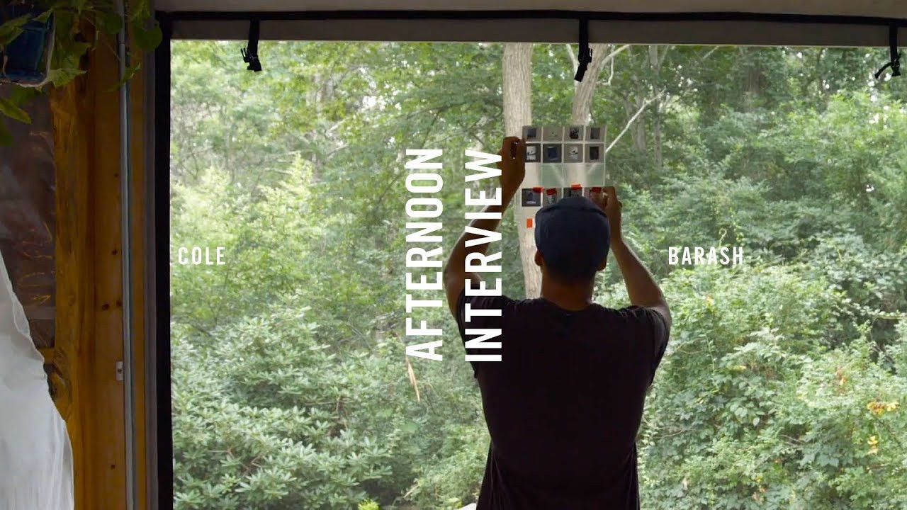 Cole Barash lives in the What Youth family tree. Originally a snowboard photographer, Cole’s work has since evolved way beyond any board sport. His attention to the “off moments” of snowboarding, coupled with his very successful “Shiloh Series” — the use of a 20’ x 20’ backdrop to shoot a series of backlit action photos that completely separeated the rider and the obstacle from the background — steered him toward the best crews of people. He shot over 30 covers and countless ads. But it was his distaste for the industry that pushed him to move on.<br /><br />We first worked with Cole when he tagged along on our Nti Sheeto film project, as well as the Scandinavia adventure, New Scenery, New Noise, as well as publishing his incredible Six Girls, Six Cities in Issue 7. He’s since published photography books and zines on John John Florence, Craig Anderson and pursued a variety of interesting personal projects you’ll hear about in the above Afternoon Interview, this was shot on location by Michael Cukr at his studio on Cape Cod, Massachusetts.