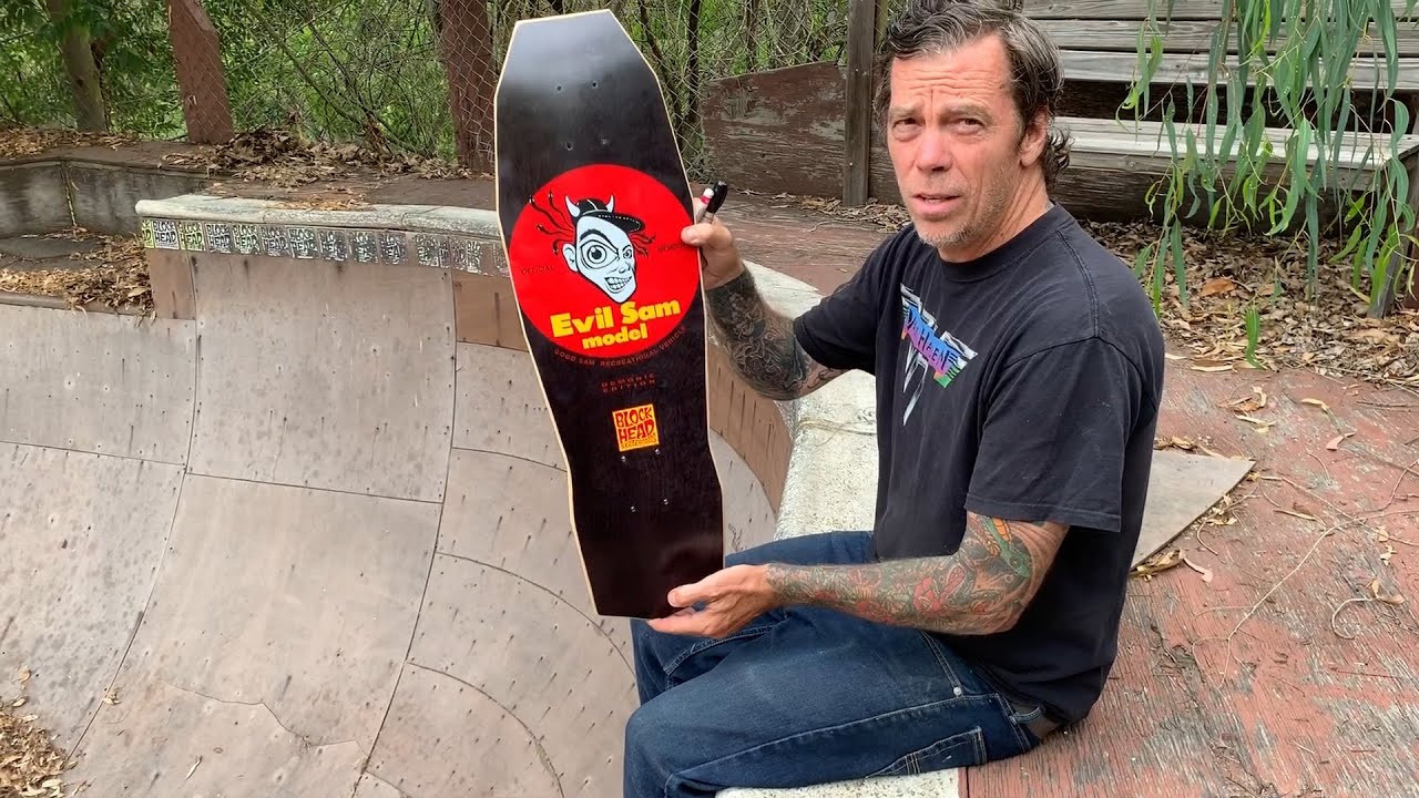 About 2 years ago we released a super limited batch of 66.6 “Evil Sam” boards (on the original 1988 shape and concave).<br /><br />People have been asking.....”what’s the .6 all about from the 66.6? Well for those who want take a stab at perhaps the most unique Blockhead offering to date, there’s one and one only of these. <br /><br />When Sam Cunningham came down to sign the Good and Evil Sam’s he grabbed what would have been #67 of the Evil’s and personally cut off 33.4% of it’s original area into a super rad and scary coffin shape. For those who might not know, Sam is a tattoo artist and specializes in vintage inspired flash with skateboarding mixed in whenever possible. Sam inked a special piece to include with this package along with a couple other goodies.<br /> <br />Instead of letting this go to the person with the quickest trigger finger, we decided that the most fair way to get this into the hands of one lucky Sam fan is to do a lottery to see who can purchase this package. There’s too much to tell here so click on over to the web site for all the info and how to enter.<br /><br />We've also got 13 Matte Black Evil Sam’s that are available Wednesday May 26th at 5PM PST and all lottery entries must be received by noon on Thursday May 27th with the drawing at 5PM. Go to blockheadskateboards.com for more info. <br /><br />Sam and I thank you for all your support!<br />Dave B.