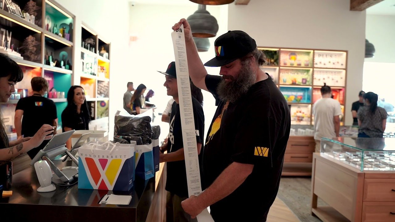 LRG has partnered with legendary cannabis and concentrate cultivator Wonbderbrett for an exclusive 710 capsule. Wonderbrett’s ultra premium products are crafted by the quality of their processes, stemming from decades of elite team experience and rare genetics. LRG hosted the grand opening of their first flagship store on 314 N La Brea in Hollywood on 7/10. <br /><br />Wonderbrett is a cannabis producer and lifestyle brand co-founded by expert cultivators Brett Feldman and Cameron Damwijk.<br /><br />In the summer of ’97, Brett was gifted the original OG Kush, a legendary West Coast strain of mythic proportions, and everything changed. Before he knew it, Brett was among the elite growers in the Los Angeles scene. When smokers wanted the best weed, they simply had to ask “You got that Brett?” By ‘99, Brett was providing cannabis to some of the biggest artists in the music industry. Dr. Dre’s influential album, 2001, was recorded with Snoop Dogg, Eminem, Xzibit, and Brett’s OG Kush in the studio.