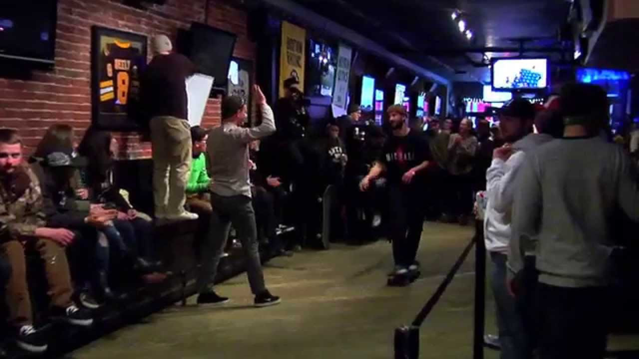First Round Match -Rob Ridge VS John Wisdom<br /><br />Everyone loves a good game of S.K.A.T.E., and most grown-ass men enjoy drinking adult beverages when spectating their favorite recreational activity. Why not put them together and have a game inside a bar?<br /><br />That was the line of thinking 3 years back when we teamed up with Converse to present the first Battle at the BARrics game of S.K.A.T.E at The North Star Bar.<br /><br />3 years later this event has become a tradition that marks the beginning of Spring here in Boston.<br /><br />On Sunday March 15th, 2015 we invited 16 of New England's finest flatgrounders to take part in this annual tradition.<br /><br />Thanks to generous support from the awesome folks at Converse we were able to up the ante and offer $800 in cash prizes.<br /><br />Tricks were done, PBR's were drunk, brackets were busted, and a great time was had by all!<br /><br />Many thanks go out to Converse CONS, Pabst Blue Ribbon, SmlTalk, and the North Star Boston for making this event possible.<br /><br />Filmed by Rob Fraebel and Michael Cirelli<br />Edited by Rob Fraebel<br /><br />Watch all of this BARrics games in this playlist - https://www.youtube.com/playlist?list=PLL3Nf9OsRfyguqSnFwRzImSYq96ap1zJD<br /><br />Follow us @orchardshop or visit www.OrchardShop.com to stay up to date for tons of different Boston Skateboarding action.