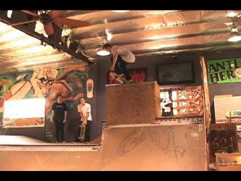 Brad does some tricks on the 621 skateshop mini ramp.