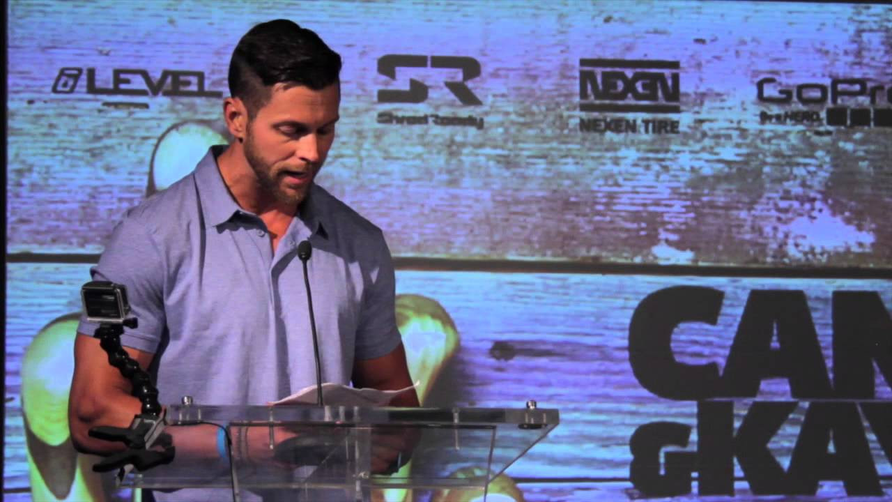 Team River Runner accepts the 2014 Paddle with Purpose Award. Decorated Marine veteran and expedition kayaker-filmmaker Cody Howard presents the philanthropic award at the 2014 Canoe & Kayak Awards, August 7 in Salt Lake City.