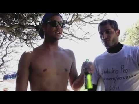 Summer in Cape Town. And there's a showdown a-happening!<br /><br />Jordy Smith, Travis Logie, Craig Anderson & Dooma Fahrenfort have arrived ... but not to surf. No, no, the Llandudno Pro, is bigger than them, it's bigger than surfing! They will be judges only.<br /><br />It's a battle to the death -- three heats -- featuring superstars Greg "Kap Attack" Kaplan and his nemesis, Steve "Laces" Michelson.<br /><br />A packed crowd on the beach have arrived with cartons of Italian beer, ice, and coolers, just baying for surfer blood to be spilt at this unpronounceable strip of South African sand.