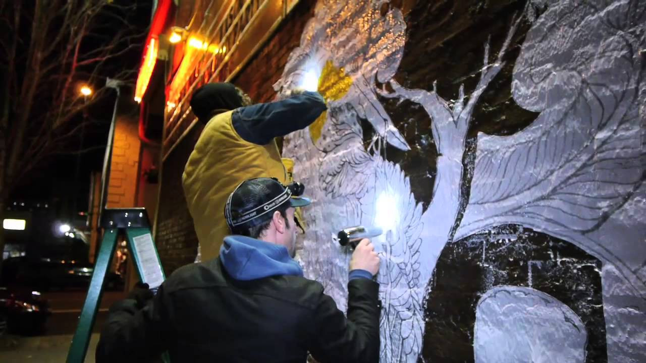 David D'Andrea combines the craftsmanship of the poster artists and album cover designers of the 1960's and 70's with a raw detailed grittiness to create an organic pen and ink style that is unmistakably his own. He contributed to our Wall to Wall series with a stunning piece on the eastside of Portland, an area teeming with bars, galleries, and music venues. His t-shirt designs, hand colored silk-screen prints and album covers are highly sought after and have won much praise from fans and admirers. He completely throws himself into his work and each new piece is an extension and evolution from the last one.<br /><br />For more go to http://www.converse.com/WalltoWall