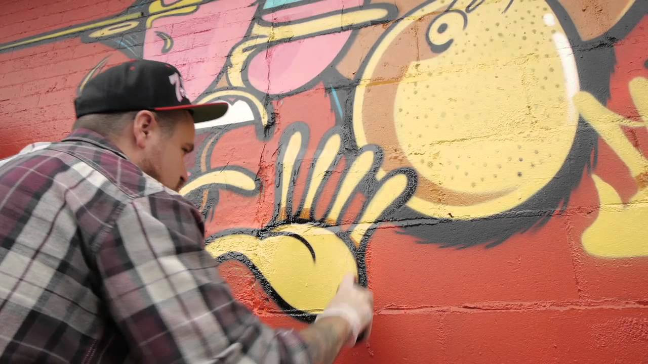 Jersey Joe headed for Brooklyn, two blocks from Converse Rubber Tracks, to bring his street art talents to the side of Grand and Union. Rooted in the middle of Williamsburg, the piece features a mix of Chucks, fall colors, and characters.<br /><br />For more on Converse Wall to Wall:<br />http://www.converse.com/walltowall