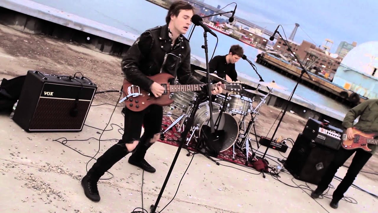 Devin didn't have to travel far to the Brooklyn Navy Yard, but when he did he and his band made quite the appearance. Tearing through their fantastic single "You're Mine," the band played at the base of a pier along the East River, with Manhattan's skyline in the background. <br /><br />Find more on Devin:<br />https://www.facebook.com/musicfromdevin<br />http://www.devinmusic.com/<br /><br />Check out Converse boots:<br />http://www.converse.com/boots<br /><br />Check out Converse Rubber Tracks:<br />http://www.converse.com/rubbertracks