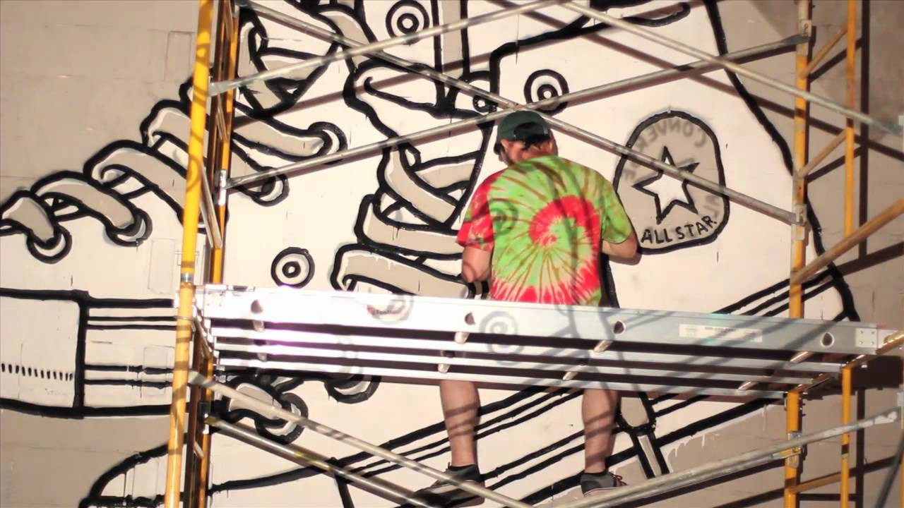 Austin based artist Josh Row took the vibrant Converse spring color palette and turned it into something wholly his own -- featuring a giraffe with rad sunglasses, a pair of Chucks, and a message that everyone can agree with. For more go to http://www.Converse.com/WalltoWall