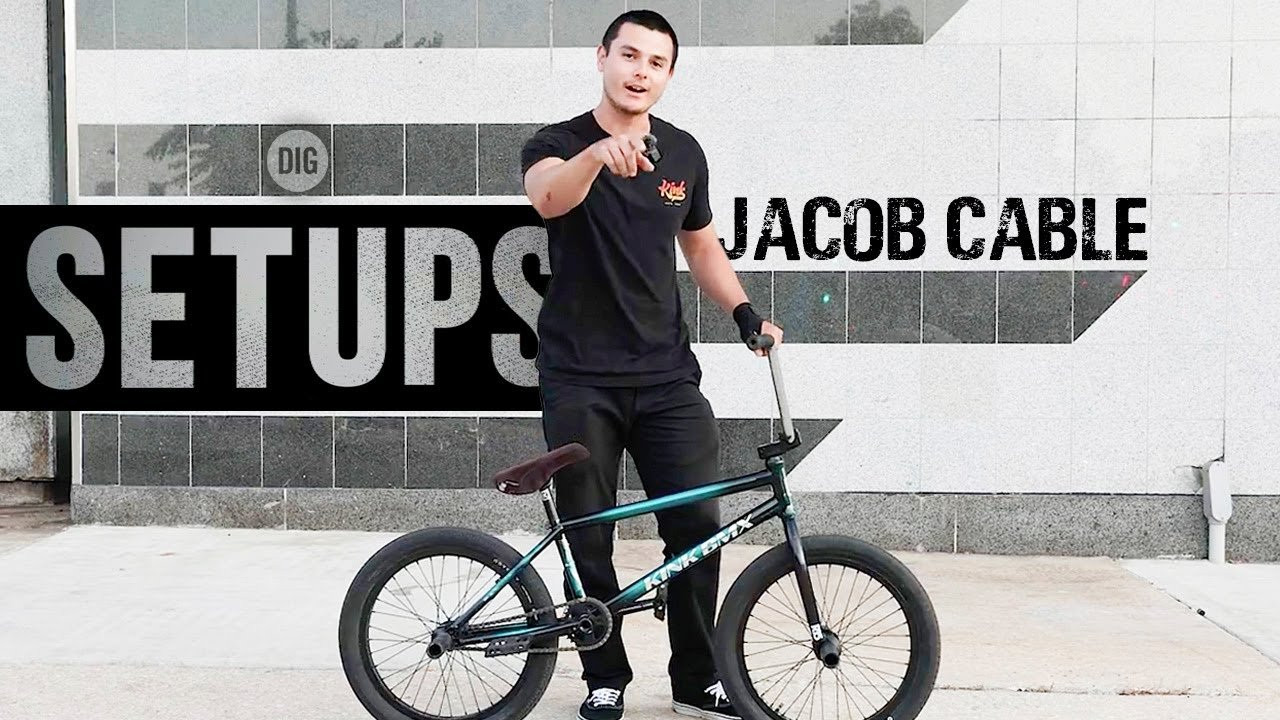 Have you watched PROJECT X? https://shop.digbmx.com/collections/project-x<br />_<br /><br />BIKE CHECK ON JACOB CABLE'S KINK KINETIC SETUP: <br /><br />-- - - - - - -<br /><br />Jacob Cable and a few words about his Kink Kinetic whip, as well as a quick interview about Kink's latest video "Thirty", his new signature frame, and his recent trip to the East Coast. <br /><br />Watch Kink "Thirty": https://digbmx.com/videos/thirty-kink-bmx<br /><br />Here's the full rundown:<br /><br />Frame: Kink Kinetic 21" TT<br /><br />Handlebars: Kink Williams<br /><br />Fork: Odyssey R 15<br /><br />Grips: Odyssey Travis<br /><br />Stem: Kink Gavel<br /><br />Headset: Odyssey Conical<br /><br />Cranks: Odyssey Thunderbolt, 170mm<br /><br />Sprocket: Kink Imprint , 28T<br /><br />Pedals: Odyssey Twisted PC<br /><br />Seat: Kink Williams<br /><br />Seat Post: Kink<br /><br />Tires: Odyssey Pat Pro, 2.4<br /><br />Front Wheel: Odyssey Vandero Pro hub with Odyssey Hazzard Lite rim<br /><br />Back Wheel: Odyssey Clutch V2 9T with Odyssey Hazzard Lite rim<br /><br />Hub guards: Kink Universal <br /><br />Pegs: Odyssey Graduate Plastic Pegs 5"<br /><br />Get more info from our Official DIG Partners<br />: https://www.kinkbmx.com @kink@KinkBMX <br />https://www.odysseybmx.com @odsyvision <br /><br />Have you watched PROJECT X? https://shop.digbmx.com/collections/project-x<br /><br /> - - - - - - -<br />#bmx #digbmx #bikecheck<br /><br /><br />Subscribe to the DIG channel for more videos - http://bit.ly/DigBMX​​​​​<br /><br />Visit our website for more BMX videos - https://digbmx.com​​​​​​ <br /> ● Facebook - http://www.facebook.com/DIGBMX​​​​​​ <br /> ● Instagram - http://www.instagram.com/DIGBMX​​​​​​ <br /> ● Twitter - http://www.twitter.com/DIGBMX​​​​​​