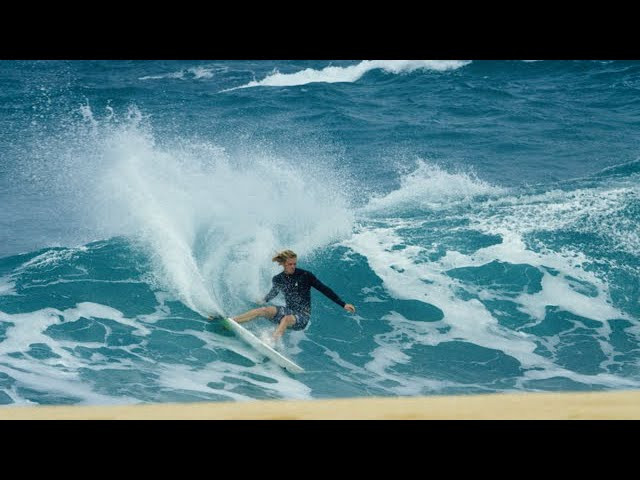 Jon Pyzel showing the crew at SURFER around his factory in Hawaii.