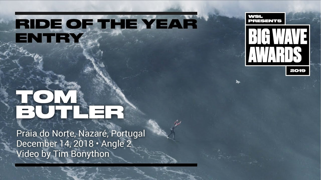 Tom Butler, (Newquay, Cornwall, United Kingdom) tows into a massive left on one of the biggest days of the year,, skitters down a steep face at maximum velocity and escapes the mayhem cleanly at Praia do Norte, Nazaré, Portugal on December 14, 2018. Angle 2. Video by Tim Bonython. An entry in the Ride of the Year Award category of the 2019 WSL Big Wave Awards. For more information see www.WorldSurfLeague.com/bigwaveawards