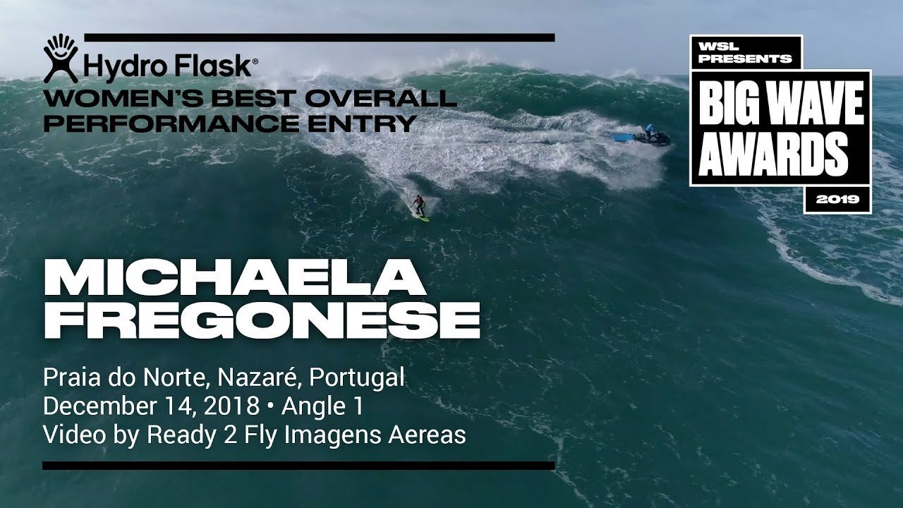 Micheala Fregonese (Rio de Janeiro, Brazil) is seen in a drone view as she tows in and tracks along a big left at Praia do Norte, Nazaré, Portugal on December 14, 2018. Video by Ready 2 Fly Imagens Aereas. An entry in the Hydro Flask Women's Overall Performance category of the 2019 WSL Big Wave Awards. For more information see www.WorldSurfLeague.com/bigwaveawards