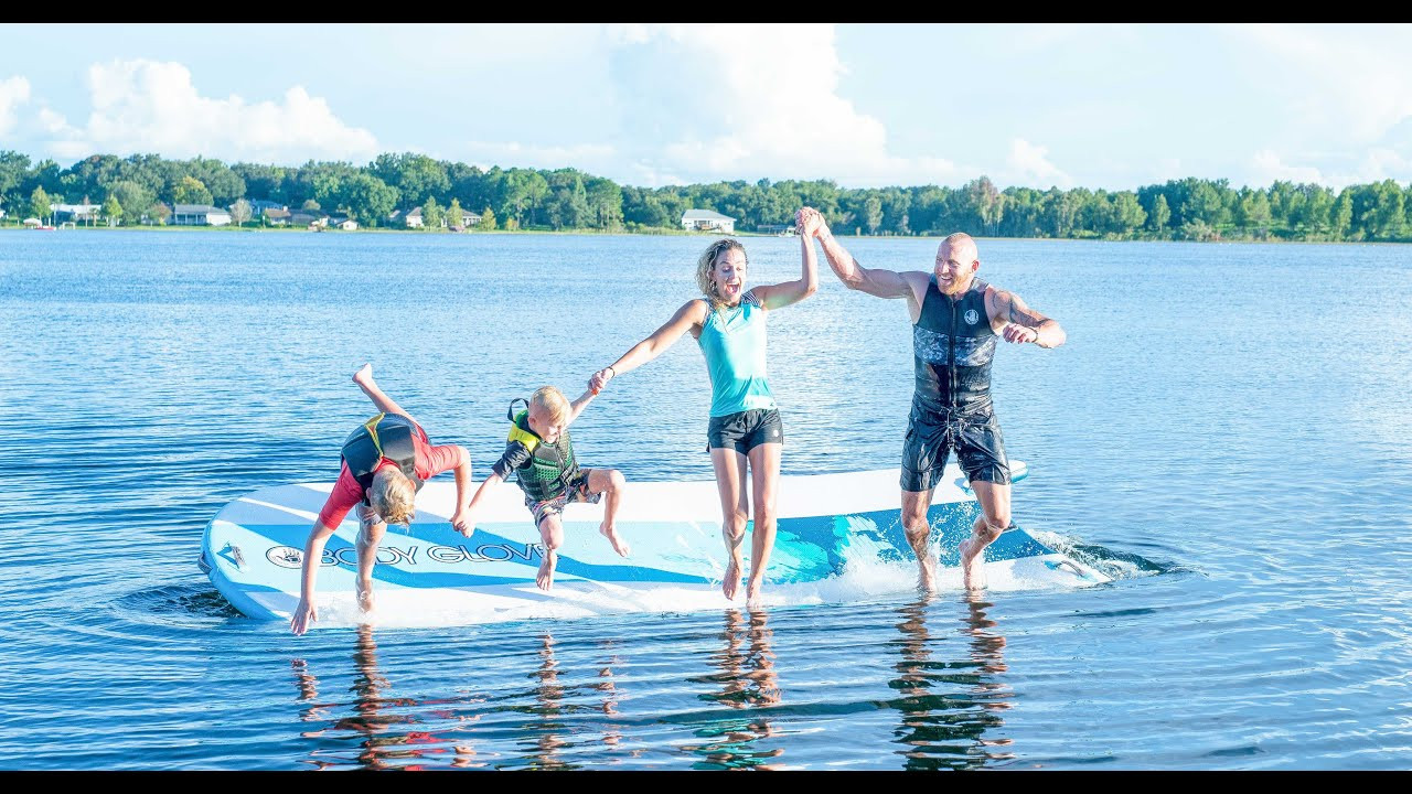 The Body Glove™ Waterpark 15 is the ultimate inflatable floating dock, perfect for family and friends on the lake. The lightweight single layer construction with double-layer side rails and the impact-resistant PVC make this dock tough enough to withstand years of fun. The Waterpark's feature-rich design also includes:<br /><br />• . A bouncy platform, perfect for diving and sliding from either a boat or a dock.<br />• . Seven wide-fabric handles make it easy to get in and out of the water, but remain out of the way to keep the top deck clear.<br />• . Front and rear bottom-mounted D-Rings for multiple easy to access anchor tie-down points.<br />• . Matching nose and tail shape to allow for multiple Waterparks to be chained together, adding unlimited length to your dock.<br />• Added nose rocker enables the waterpark to be used as a multi-person paddle board, fitting up to 8 people (paddles not included). <br /><br />Time spent on the water is always more enjoyable with family and friends and the Waterpark 15 is the perfect vessel and a must-have for every water enthusiast!<br /><br /> <br />#AllThingsWater #CreateHappiness<br /> <br />Love Body Glove? Find more of us here:<br />Facebook: https://www.facebook.com/bodyglove/<br />Instagram: https://www.instagram.com/bodyglove/<br /> https://www.instagram.com/bodyglovegirl/<br />Website: https://www.bodyglove.com/